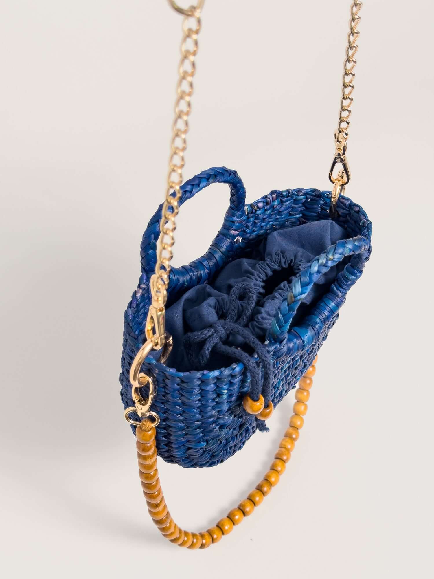 Inside Fiesta Mini reed crossbody bag with premium drawstring closure |Blue