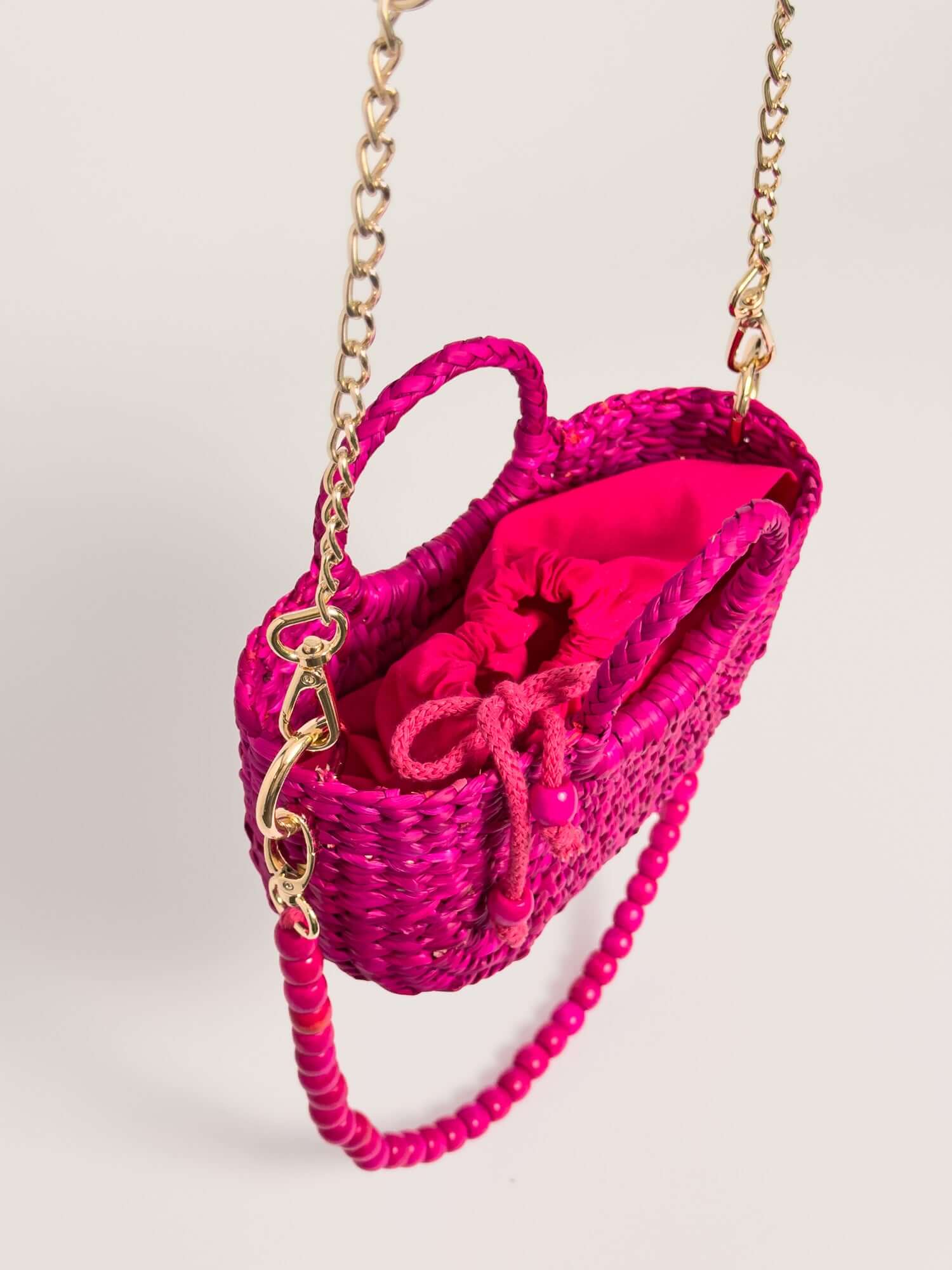 Inside Fiesta Mini reed crossbody bag with premium drawstring closure |Fuchsia