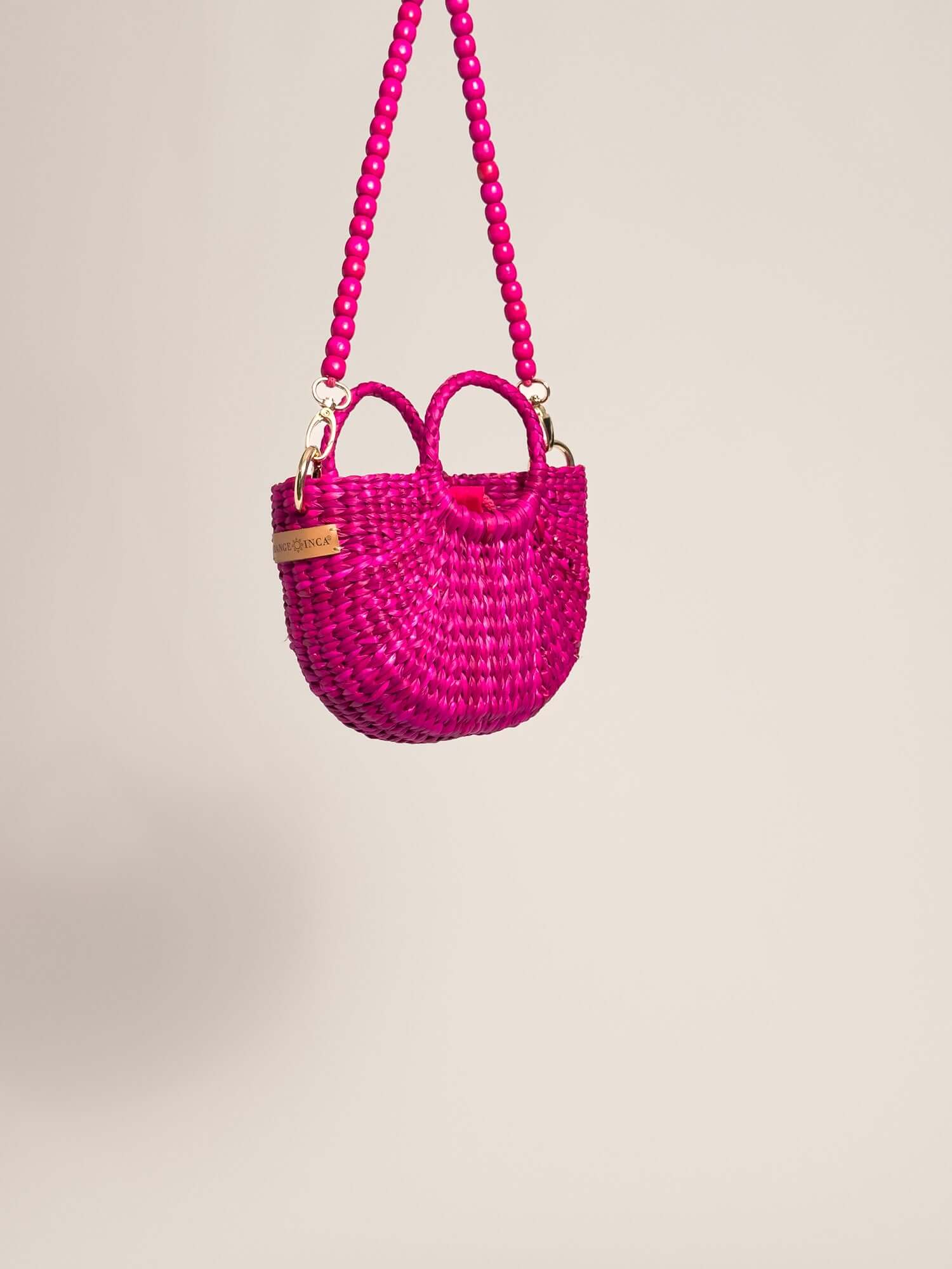 Designer mini crossbody with wooden beads strap | Fuchsia