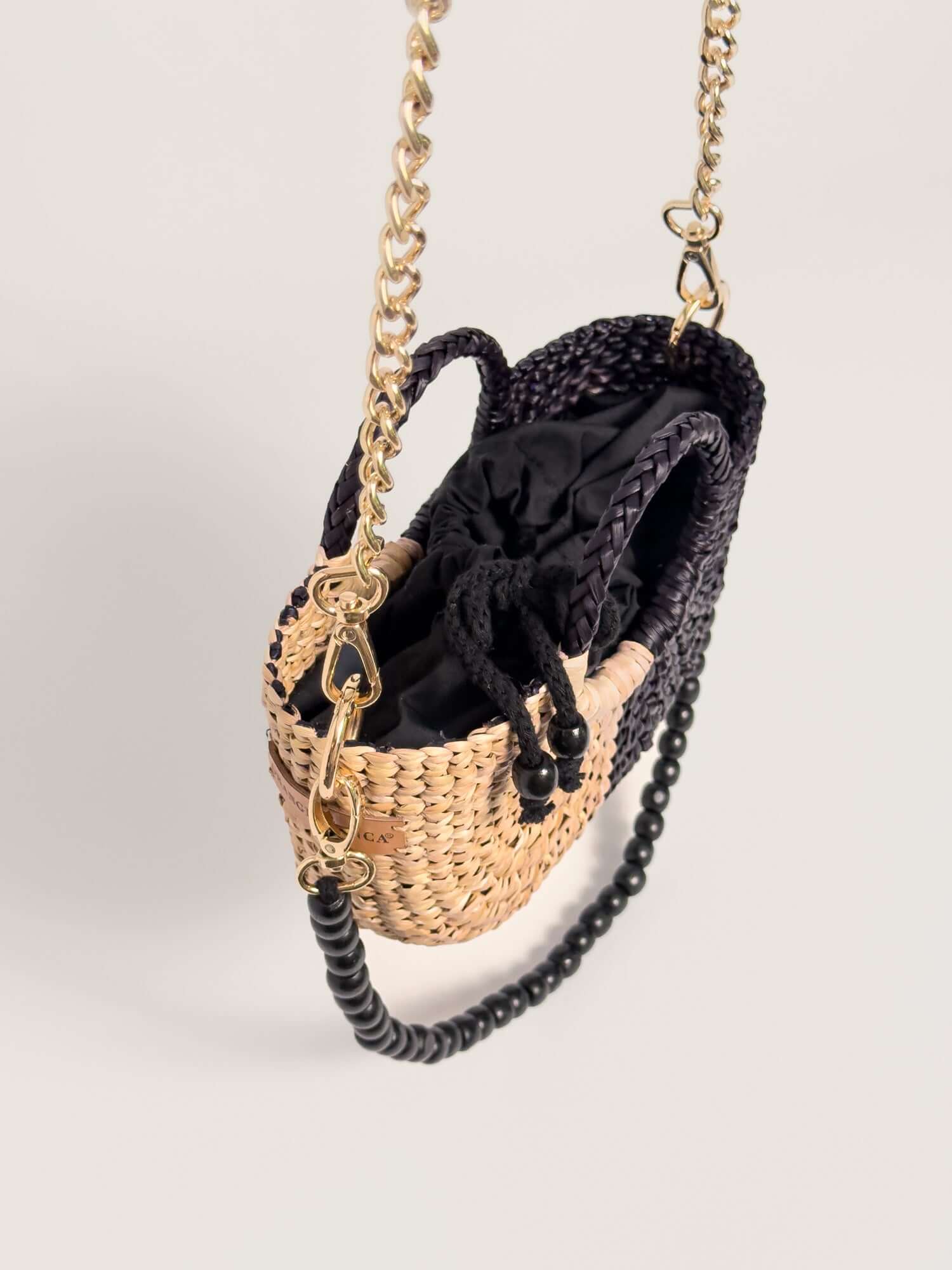 Inside Fiesta Mini reed crossbody bag with premium drawstring closure |Half Black Half Natural
