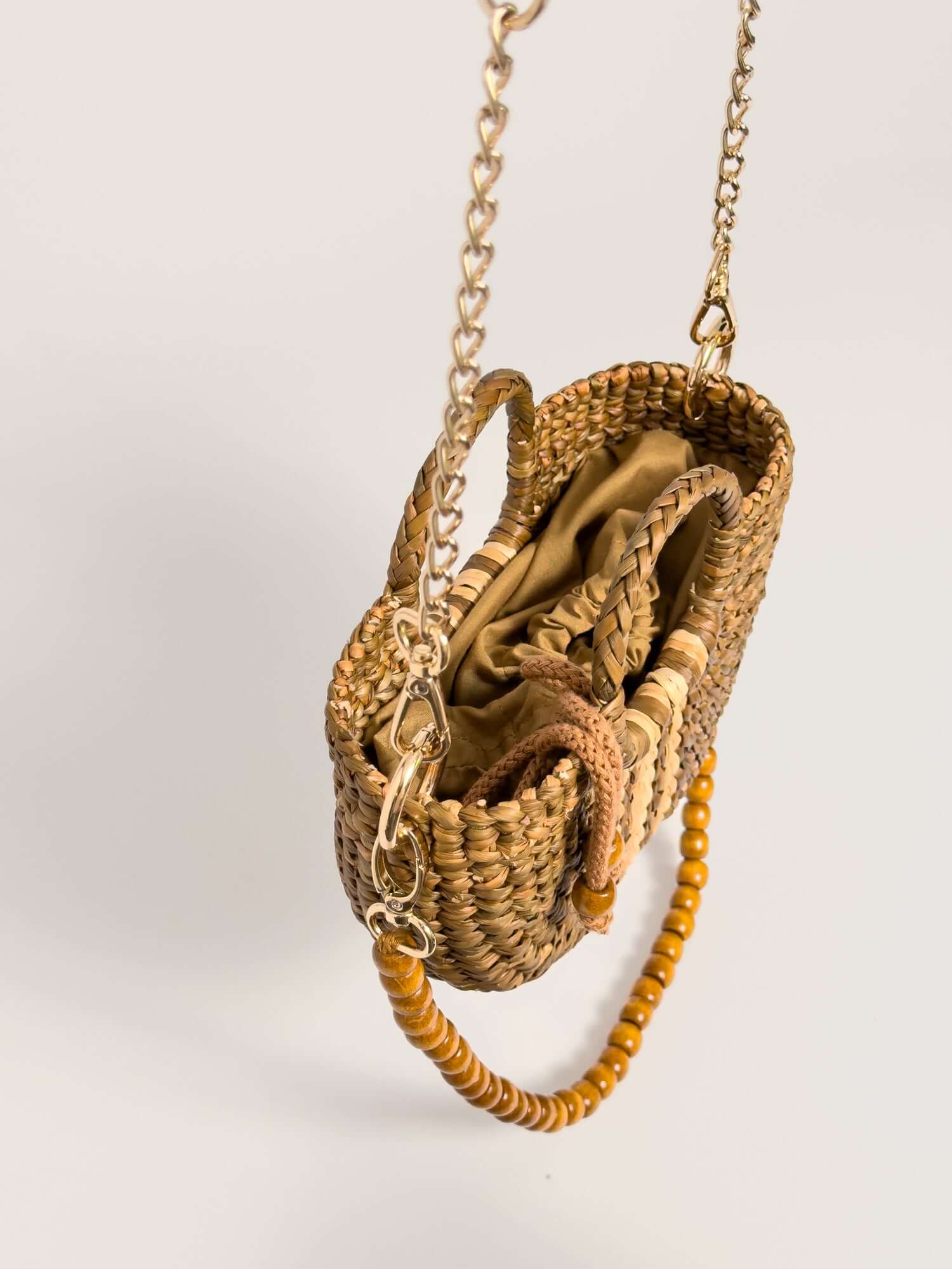 The Fiesta Mini Deluxe - Sage with Natural Band, handwoven junco crossbody bag, natural fibre handbag with chain and wooden bead strap.