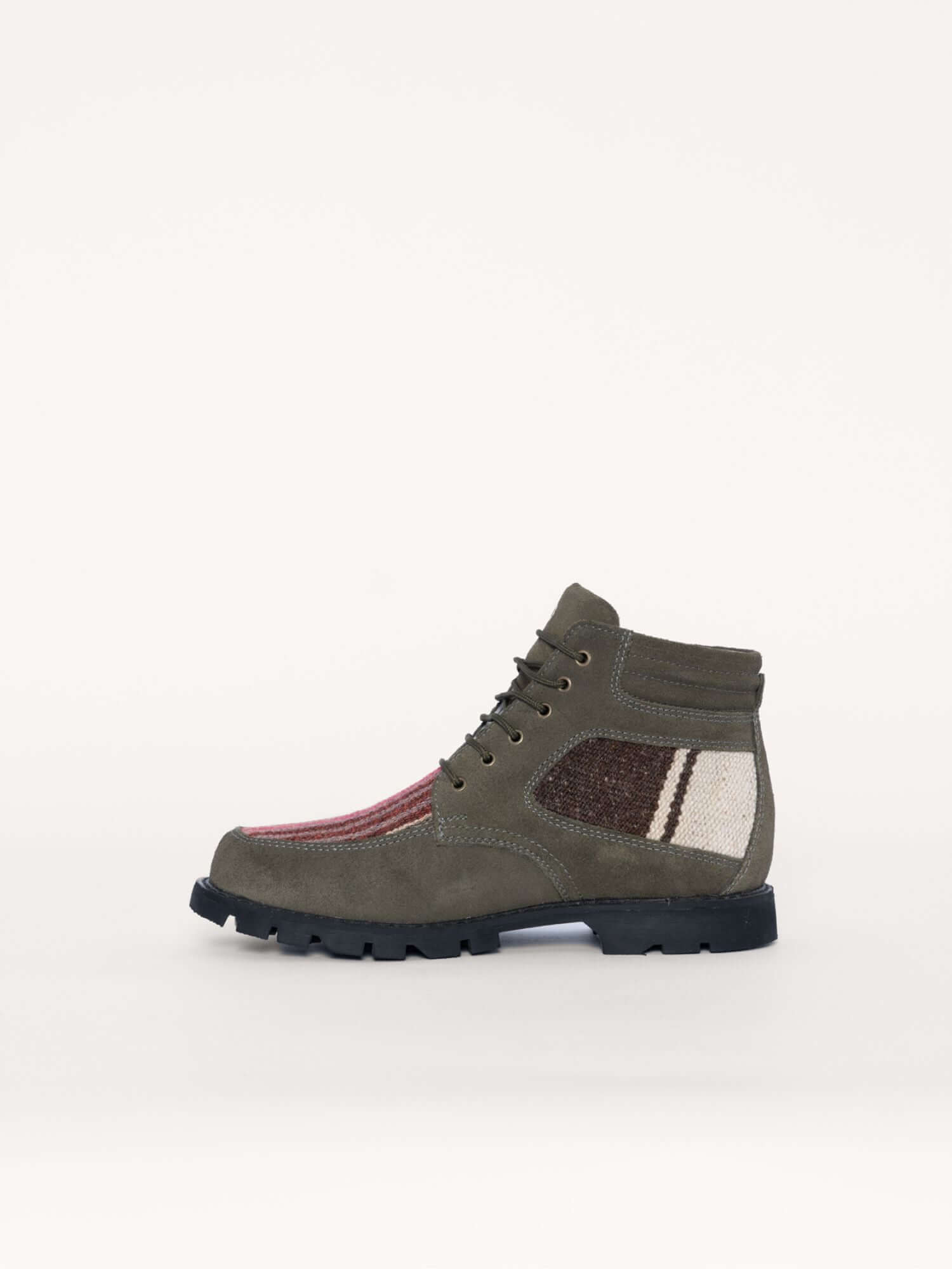Handmade leather and wool ankle boots in military green, left side.