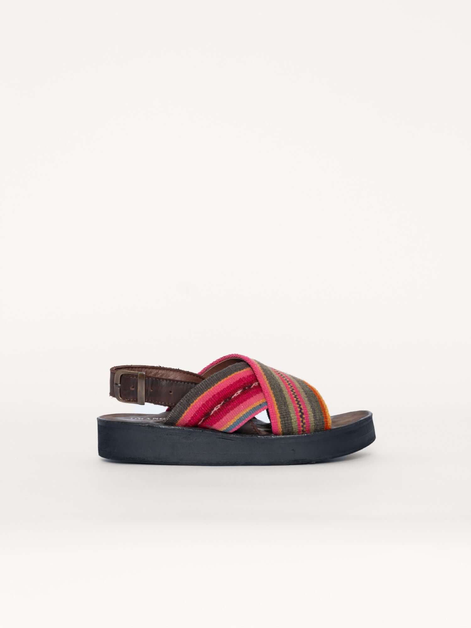 Green and pink wool strap x sandals with leather soles and back strap, right side view.