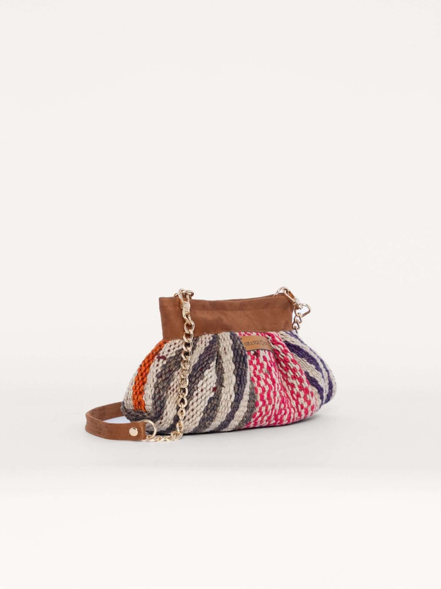 Sol handwoven wool crossbody pouch with camel suede trim – gold chain strap | Orange Inca