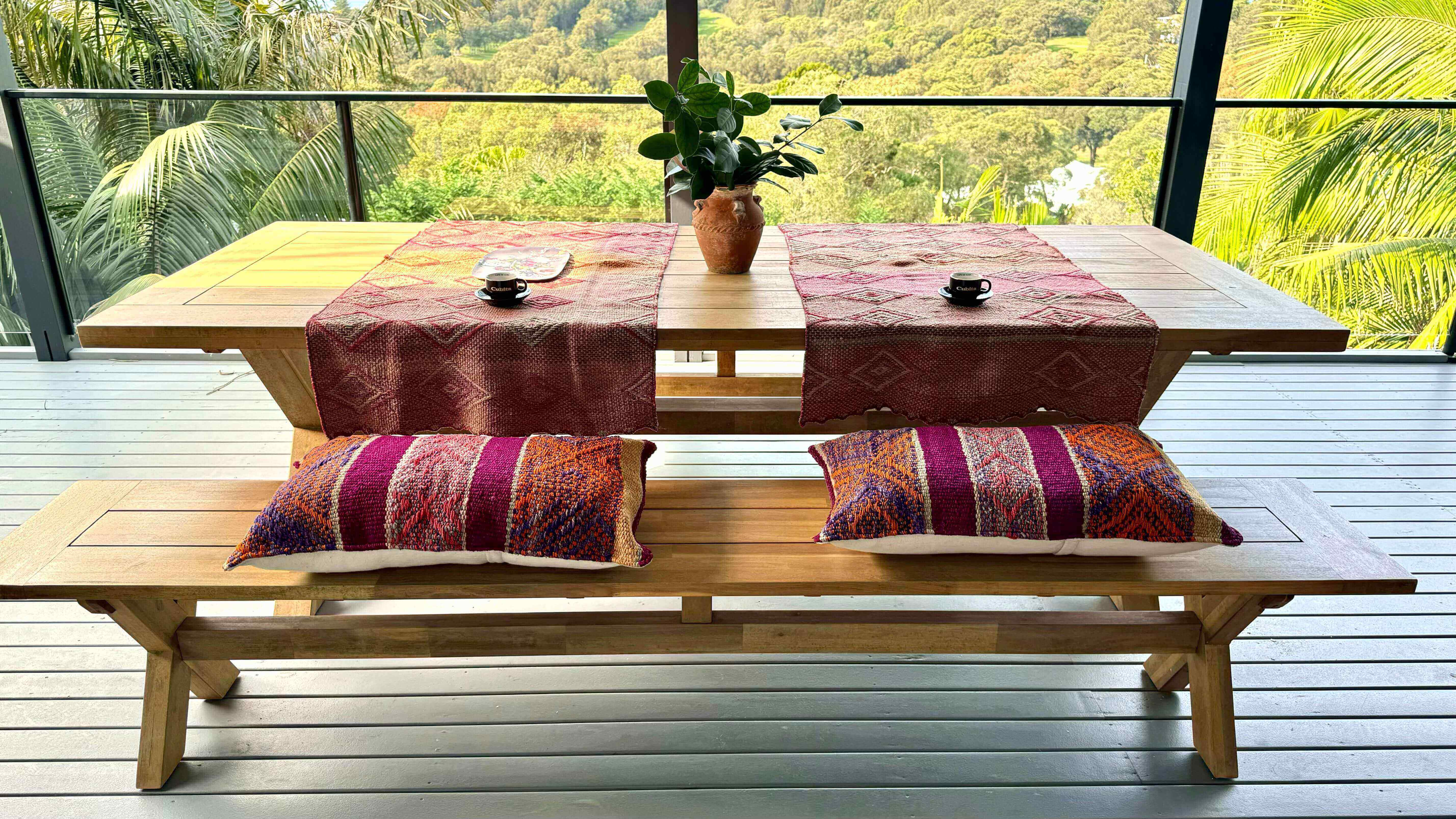 Table runners and lumbar cushions in al fresco setting. Handwoven, natural dyes and a unique bold statement nobody else will have.