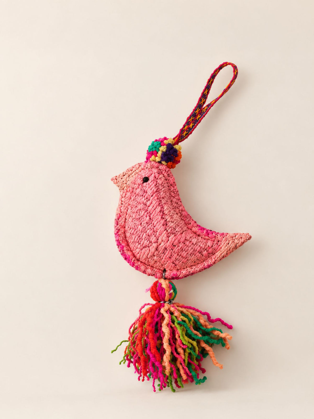 Large bird wool tassel in pinks with a multicolour wool tassel and woven strap – handmade in Peru | Tasselita by Orange Inca