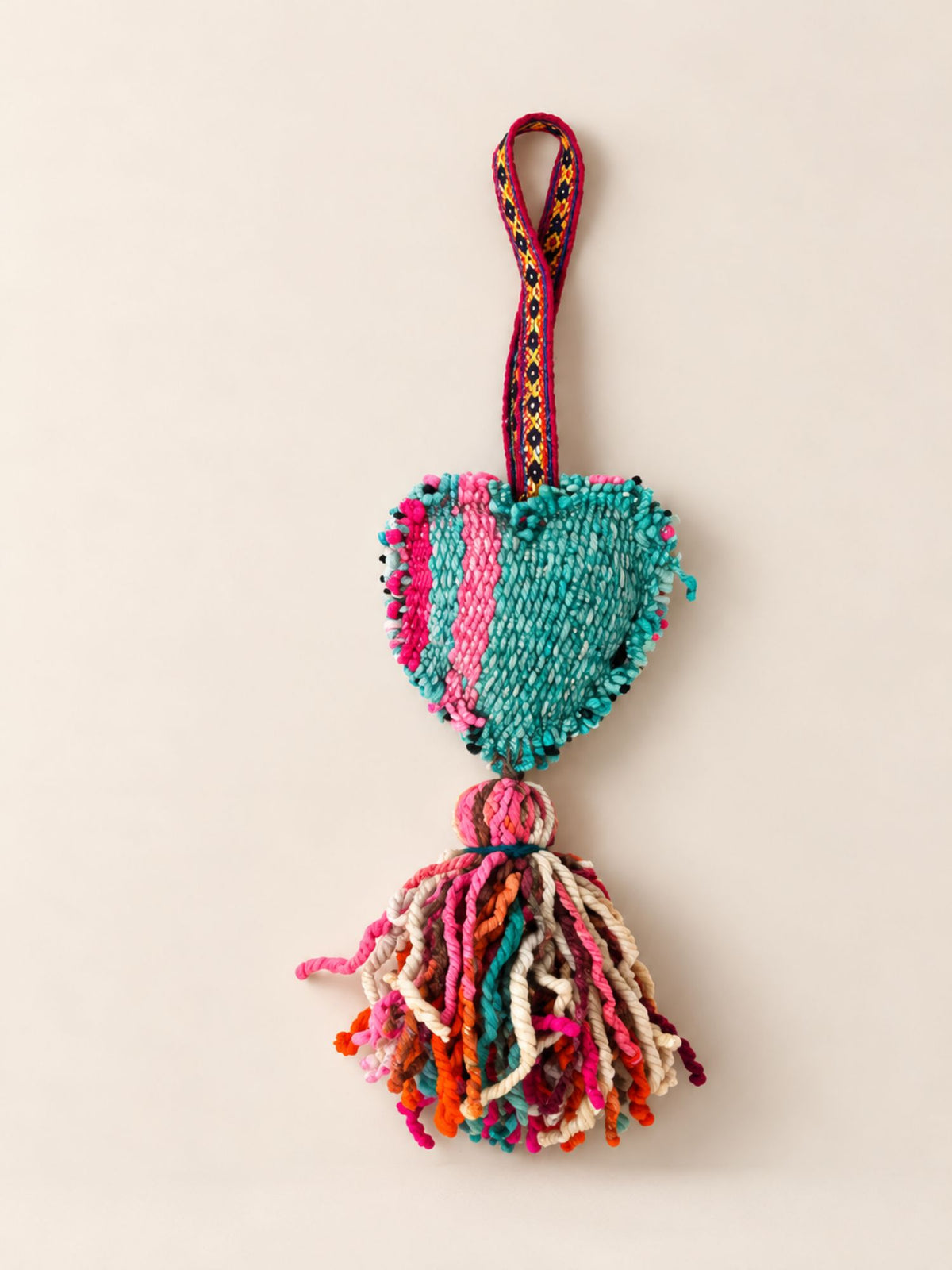 Medium heart wool tassel in naturally dyed frazada wool with a multicolour tassel – handmade in Peru | Tasselita by Orange Inca