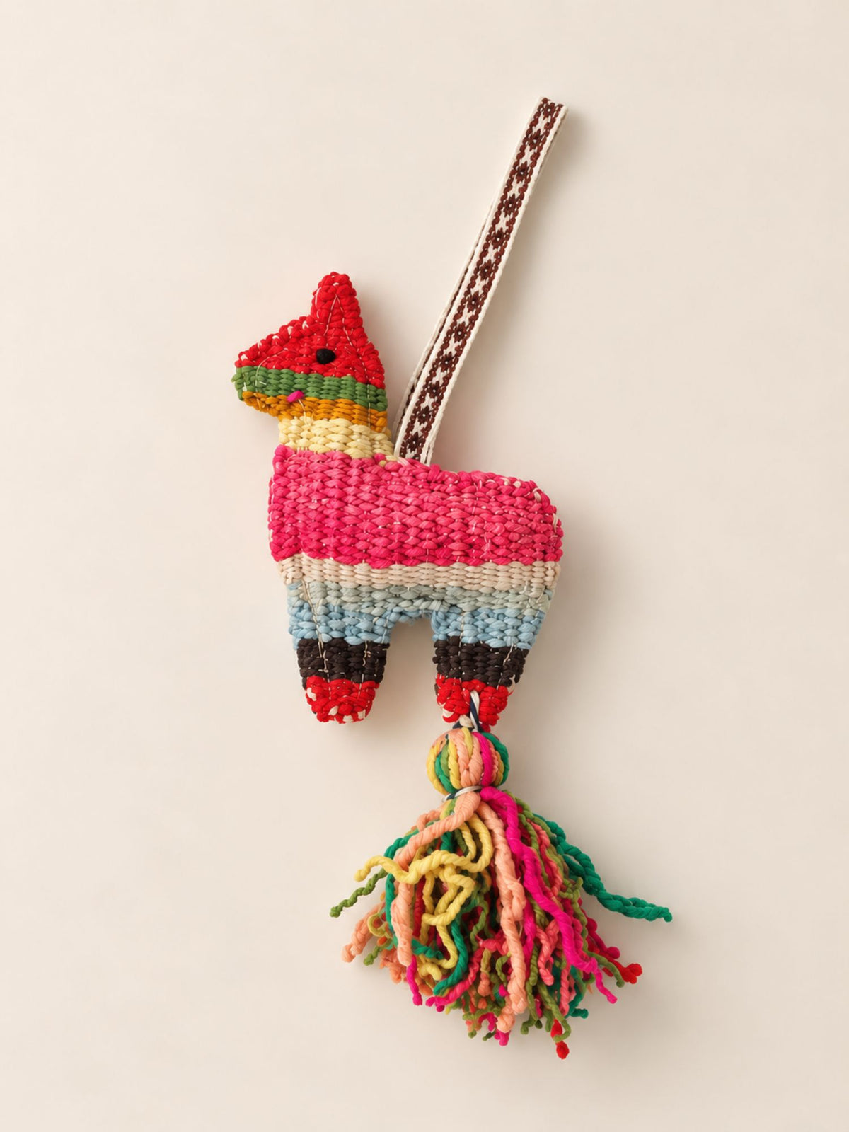 Large llama wool tassel in striped pinks, blues and black with a multicolour tassel – handmade in Peru | Tasselita by Orange Inca