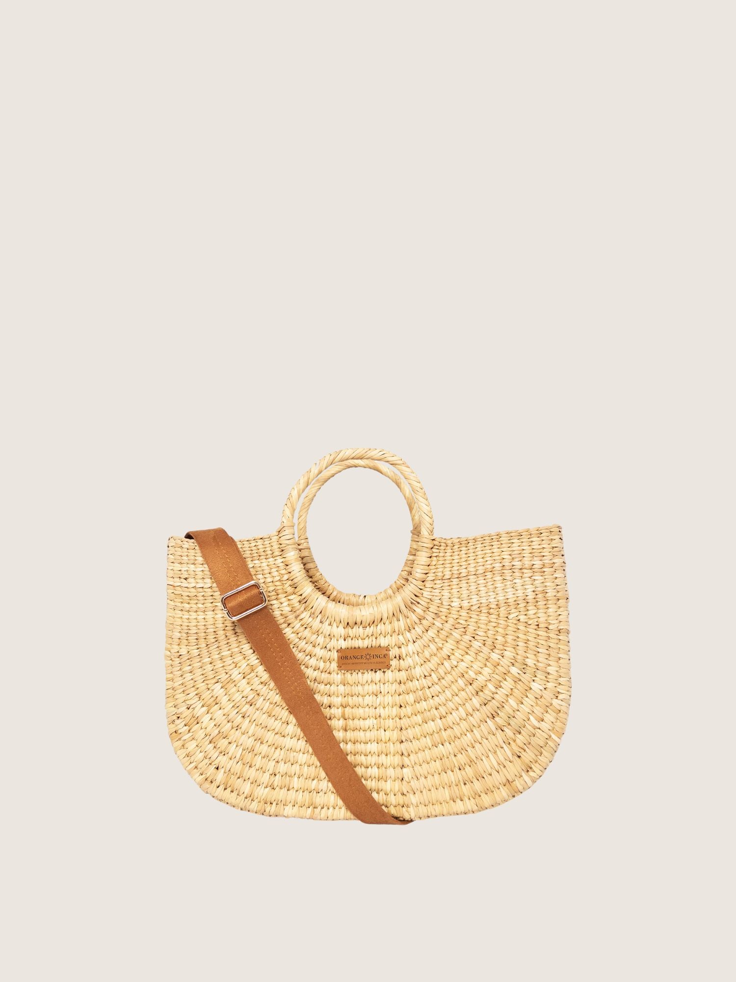 Gran Fiesta Crossbody Tote - Natural handwoven junco tote bag with structured handles and adjustable strap.
