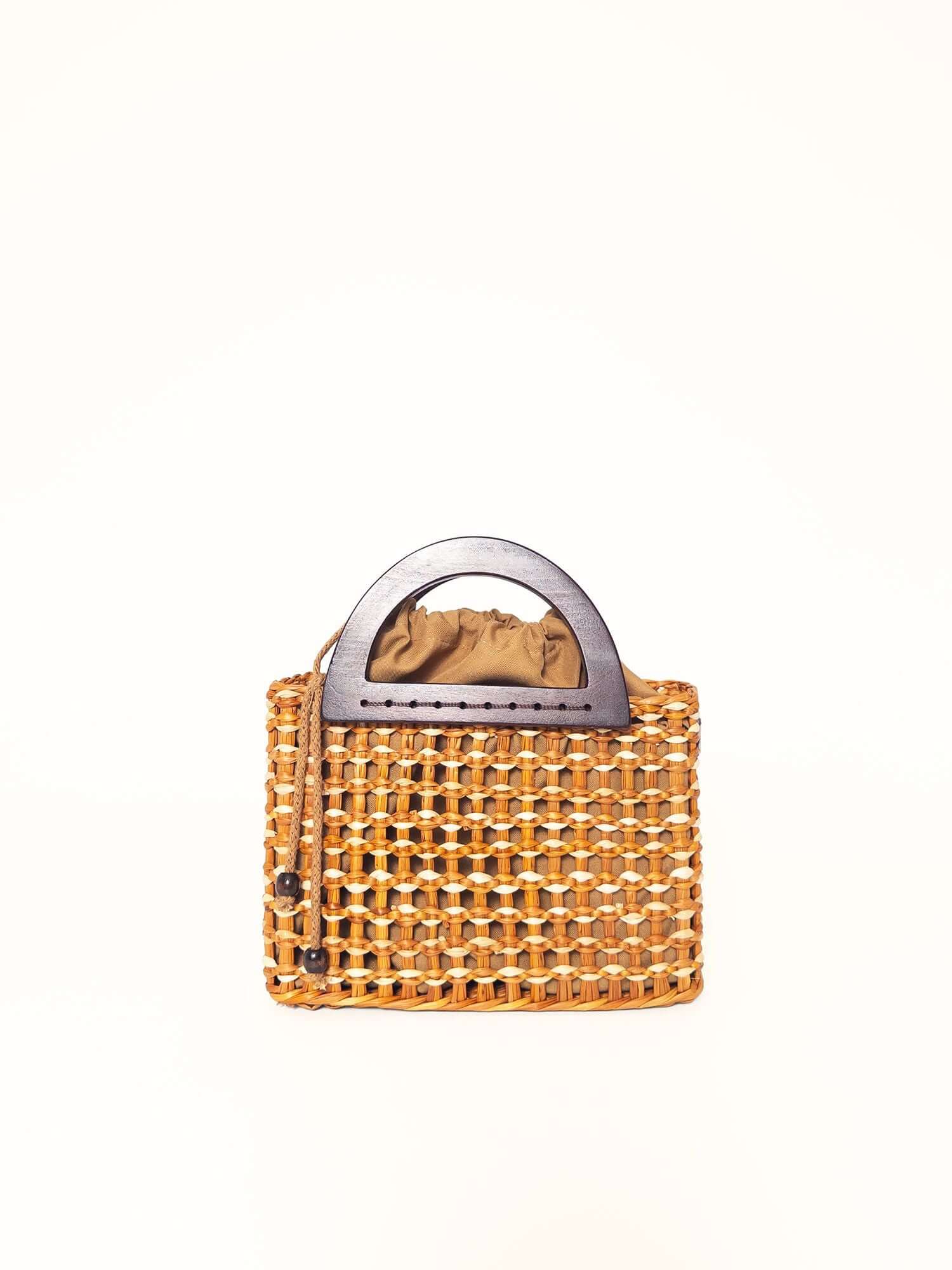 Brigitte woven handbag camel and natural angle view – cotton-lined, drawstring closure | Orange Inca