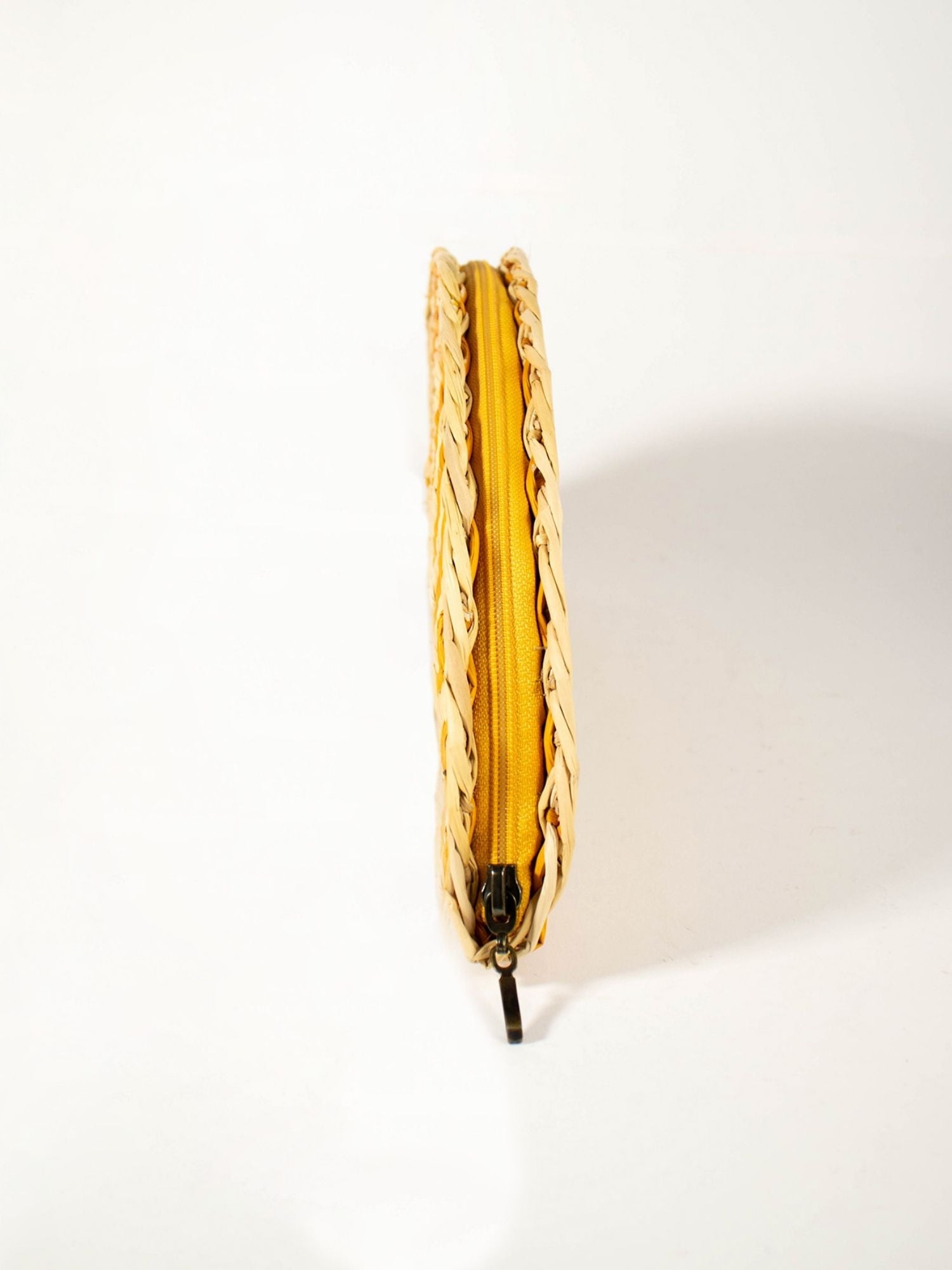 Detail of handwoven natural reed weave, Flamenco Clutch – Natural & Yellow | Orange Inca