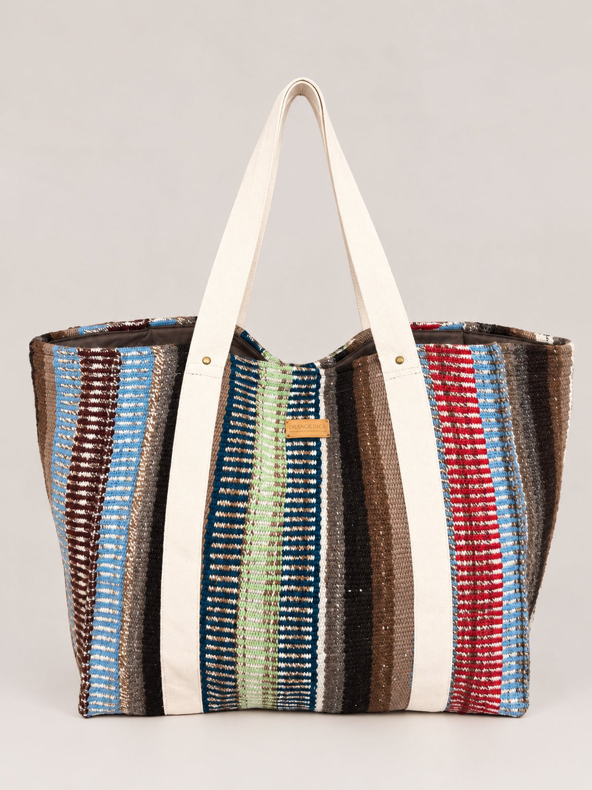 The Manta Carryall in Blue, Green and Berry Stripes — front view