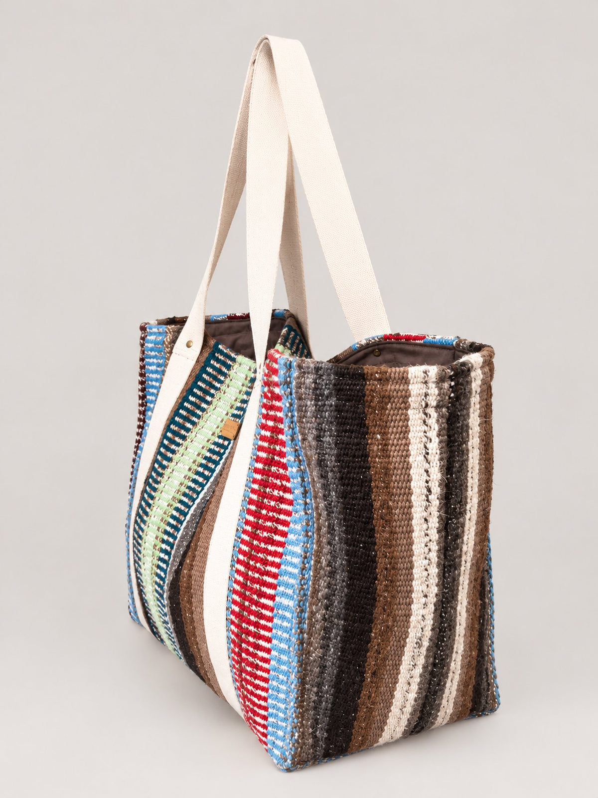 The Manta Carryall in Blue, Green and Berry Stripes — side view