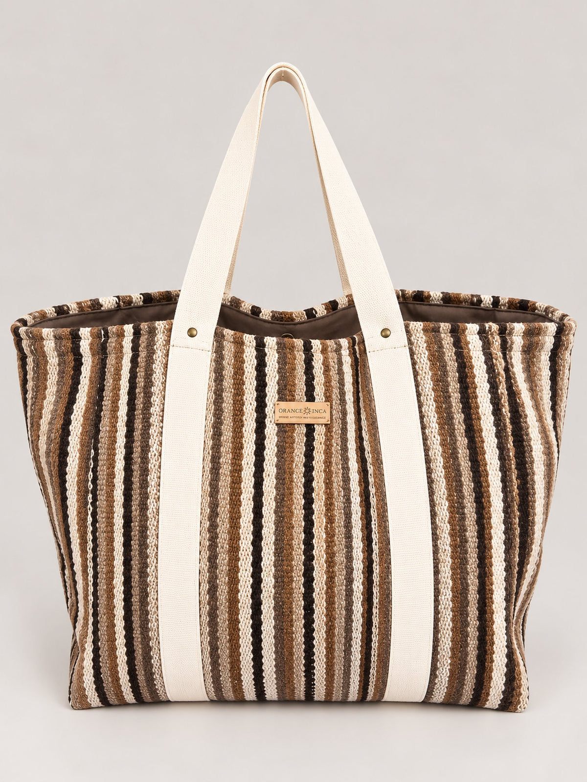 The Manta Carryall in Brown and Cream Stripes — front view