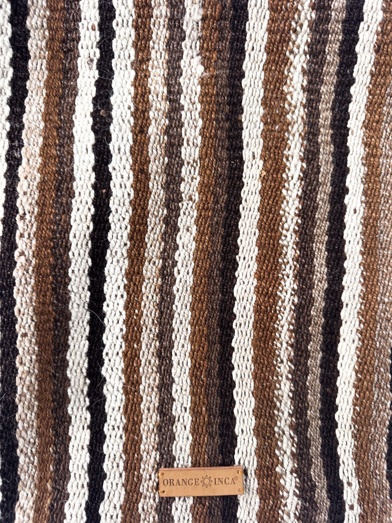 Manta Fringe Clutch - Browns and Ivory Stripes