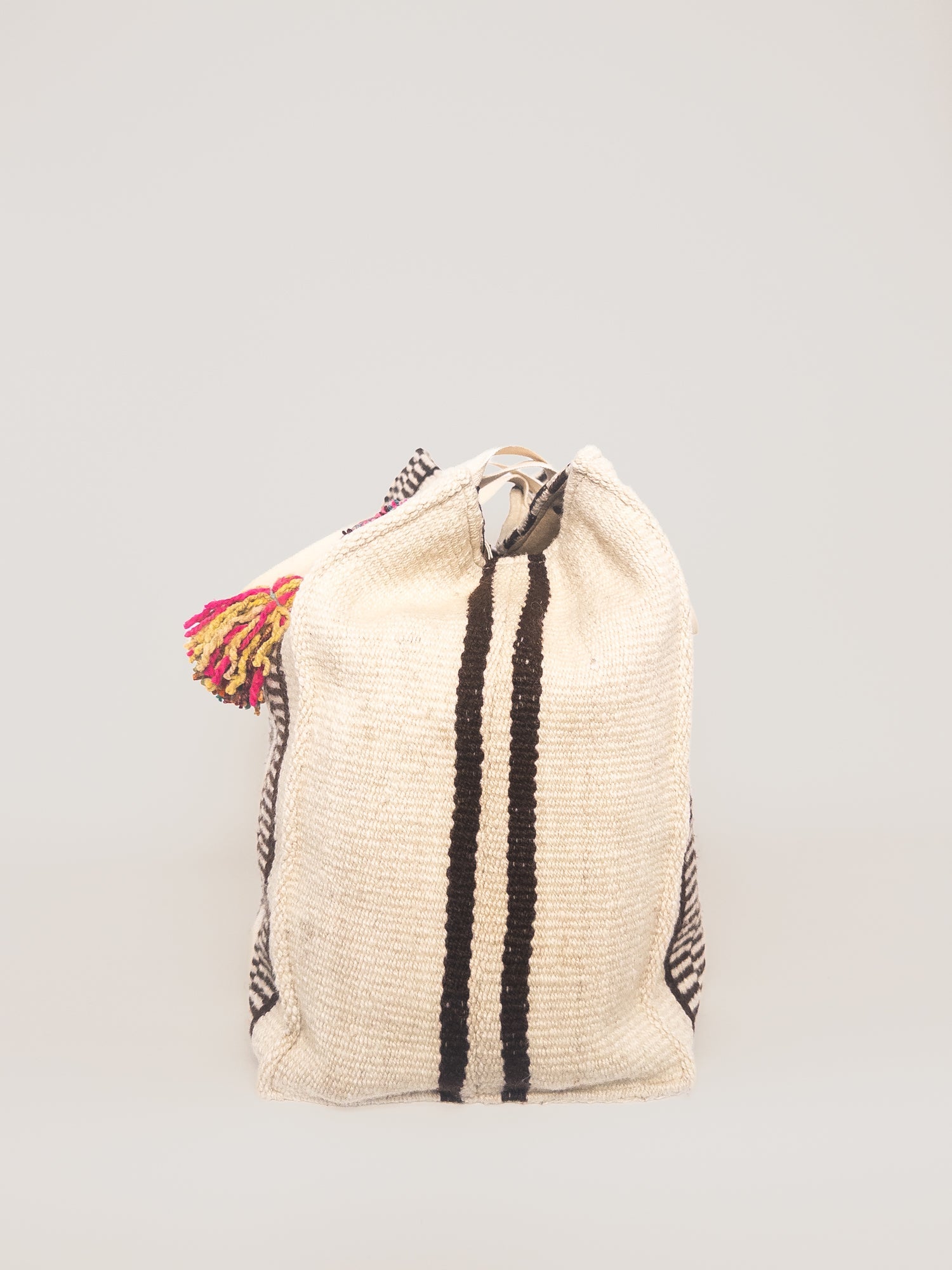 Manta Weekender – Earthy Tones, side view | Orange Inca