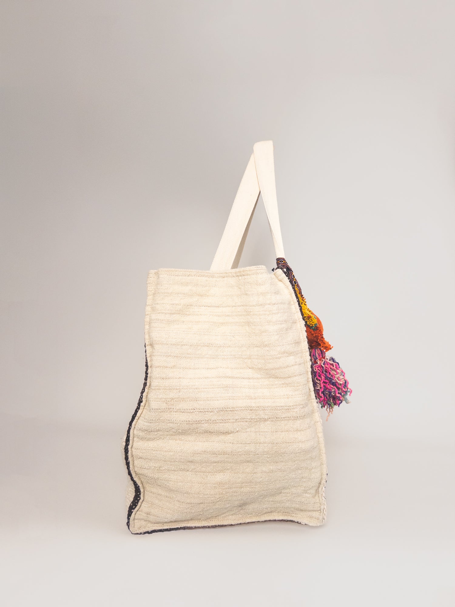 Manta Weekender – Earthy Tones and Ivory, ivory wool side panel | Orange Inca