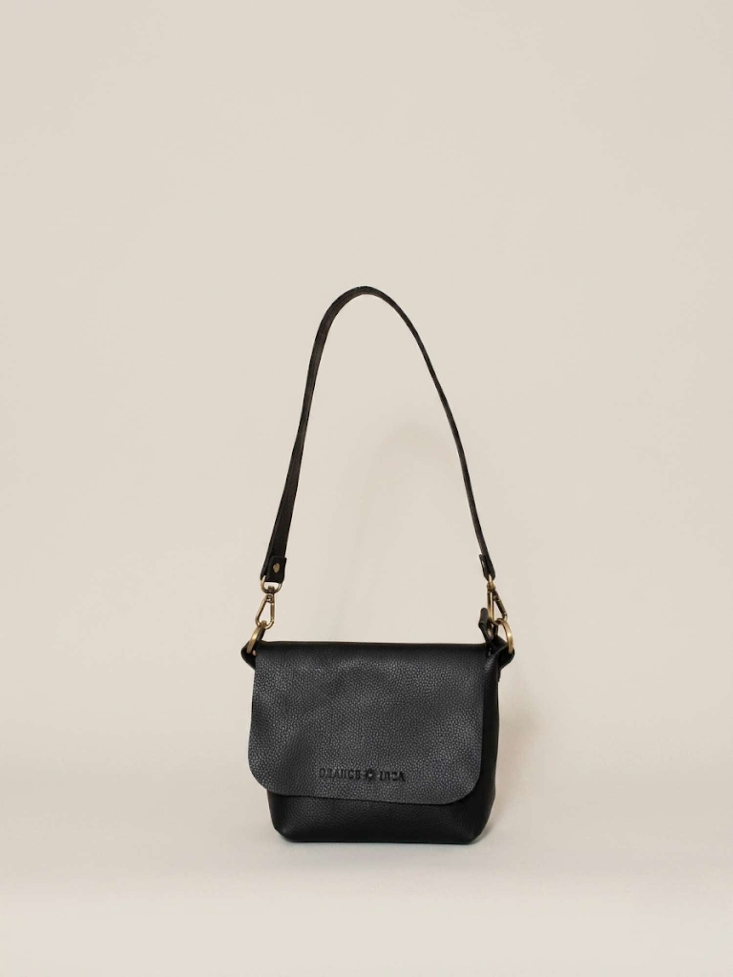 Black Olivia leather crossbody — shoulder strap fitted, soft tumbled leather | Orange Inca