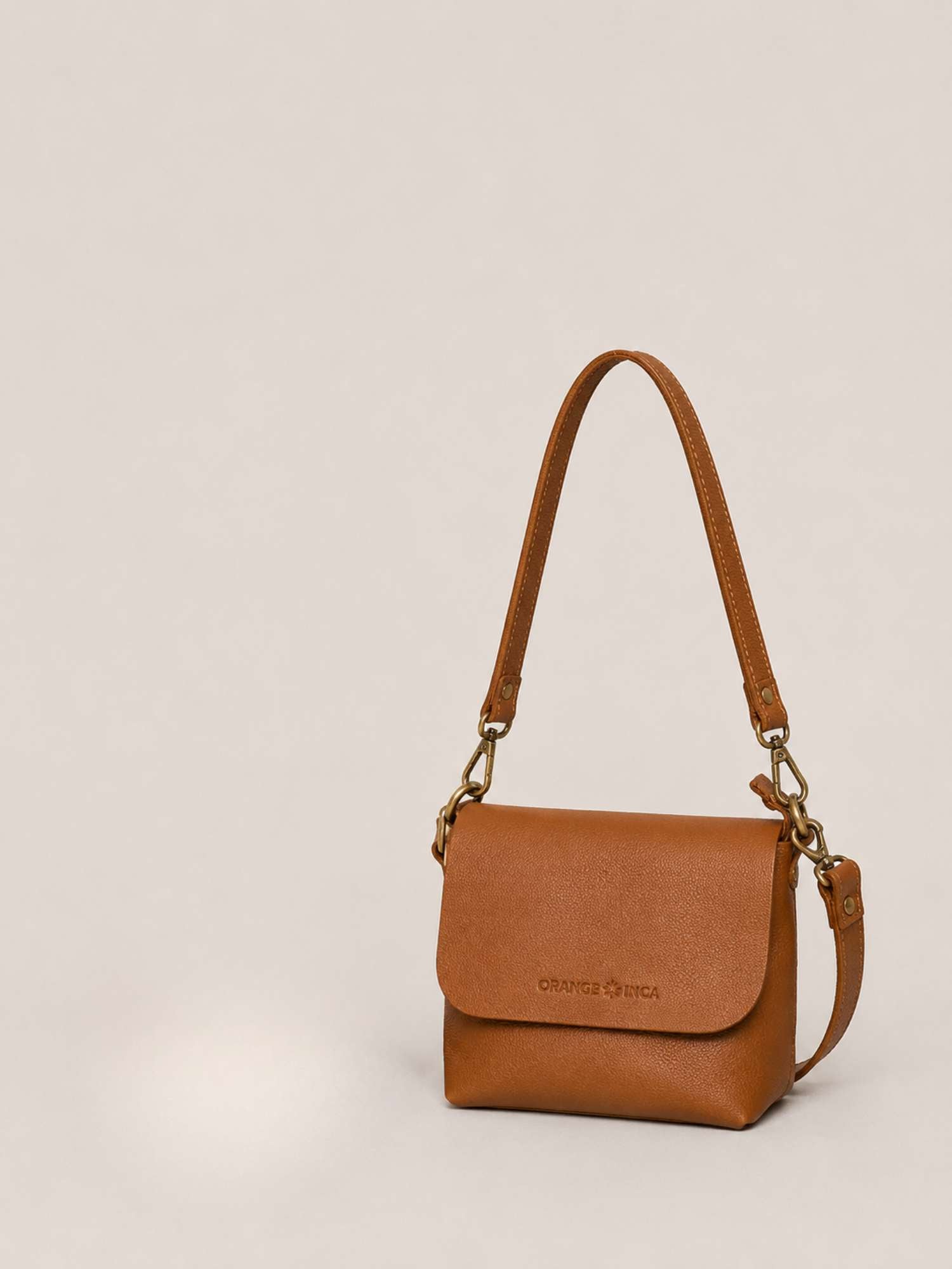 Cognac Olivia leather crossbody — alternative angle, antique brass hardware | Orange Inca