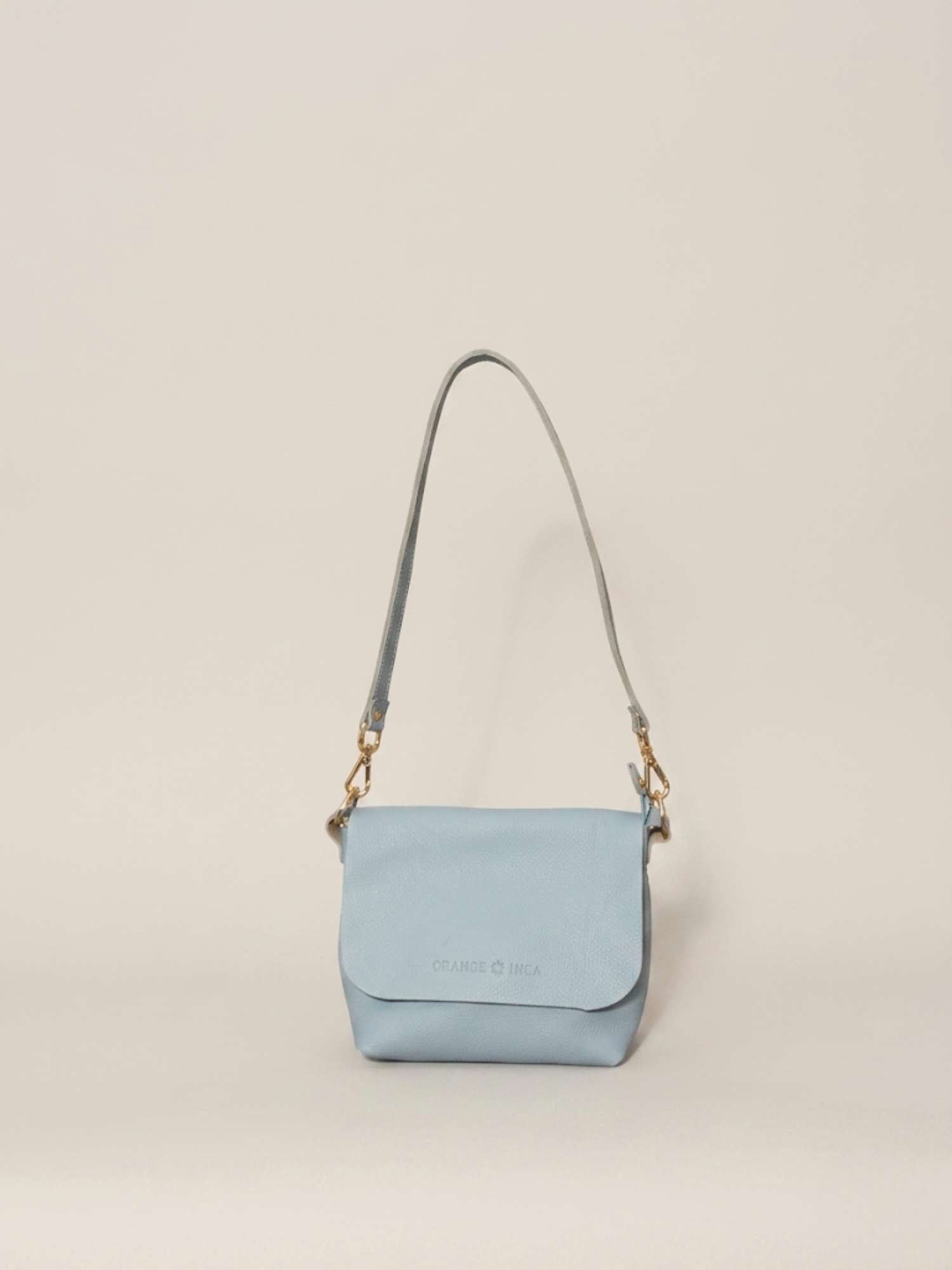 Powder Blue Olivia leather crossbody — shoulder strap fitted, soft tumbled leather | Orange Inca
