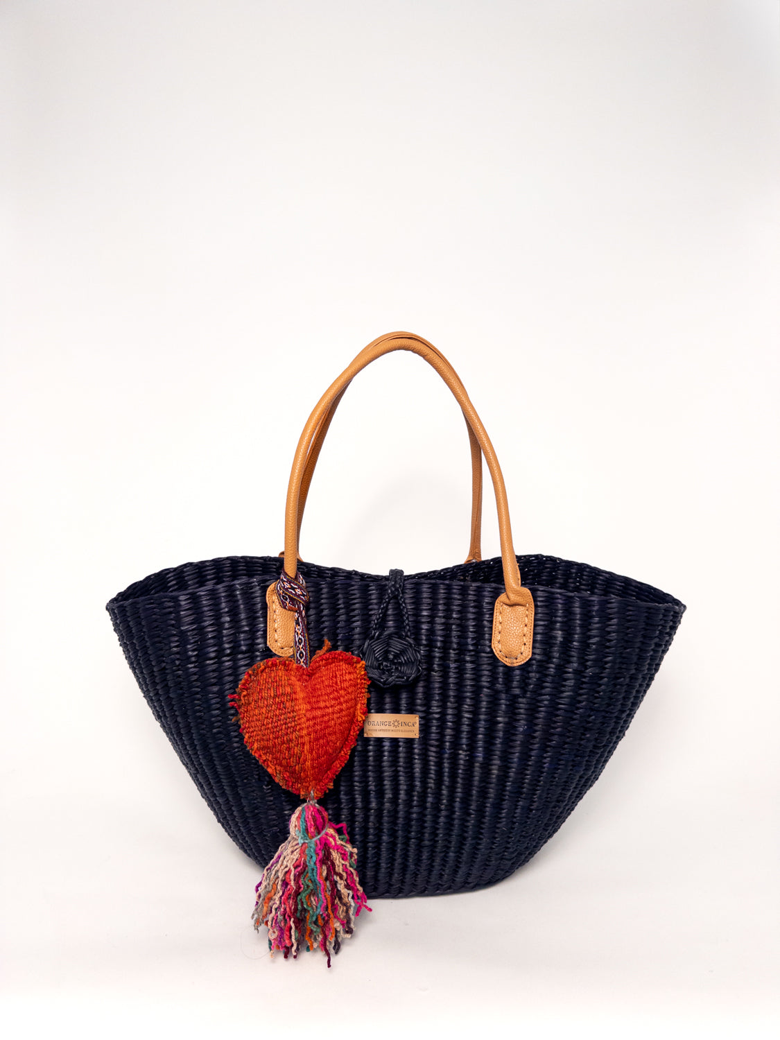 Playa Tote - Black, handwoven junco tote bag, natural dyes, faux leather straps, with heart-shaped coin purse and tassel.