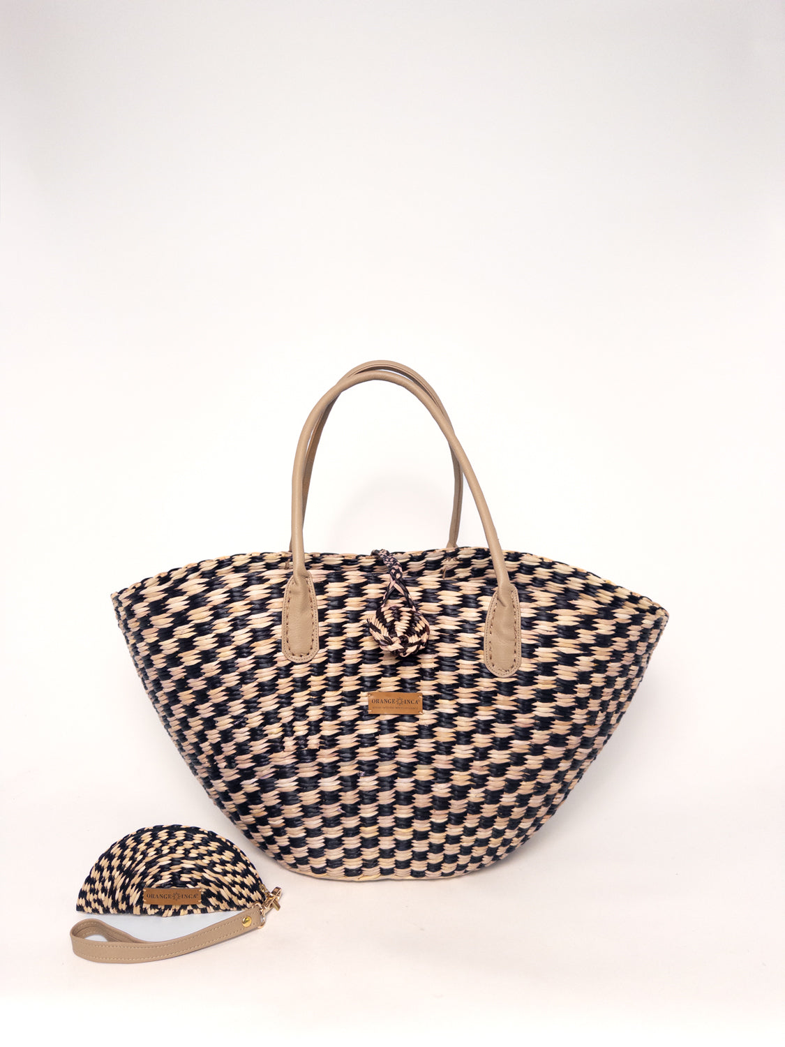 Playa Tote - Checkered Black and Natural, handwoven junco tote bag with faux leather straps and natural dyes.