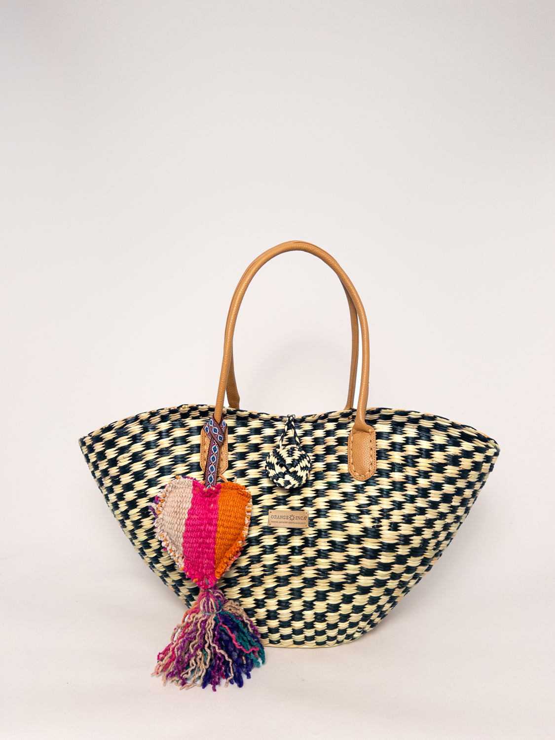 Playa Tote - Checkered Olive Green and Natural, handwoven junco tote bag with faux leather straps and decorative tassel.