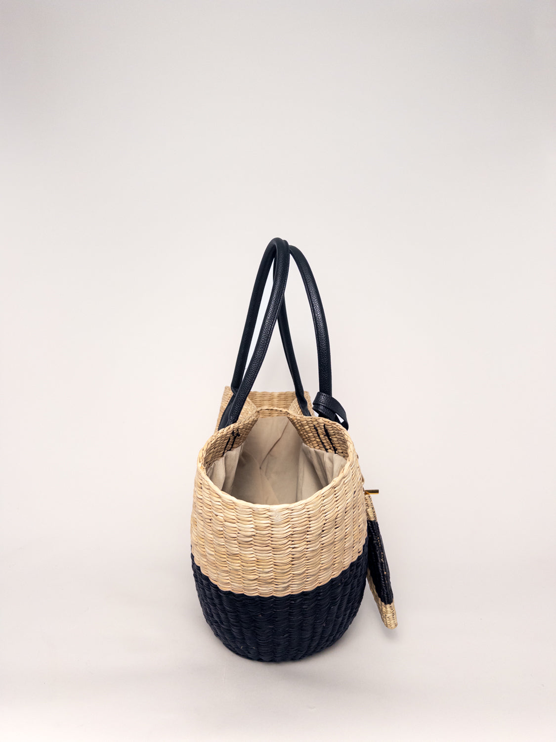 Playa Tote - Half Natural Half Black, handwoven junco tote bag, sustainable junco reed, faux leather straps.