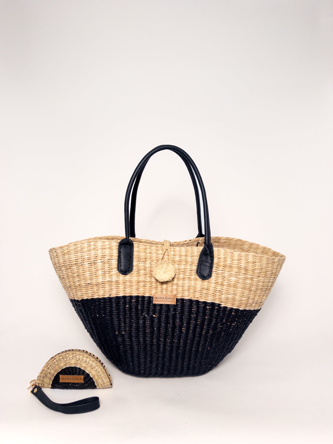 Playa Tote - Half Natural Half Black, handwoven junco tote bag, natural dyes, faux leather straps, cotton drawstring closure.