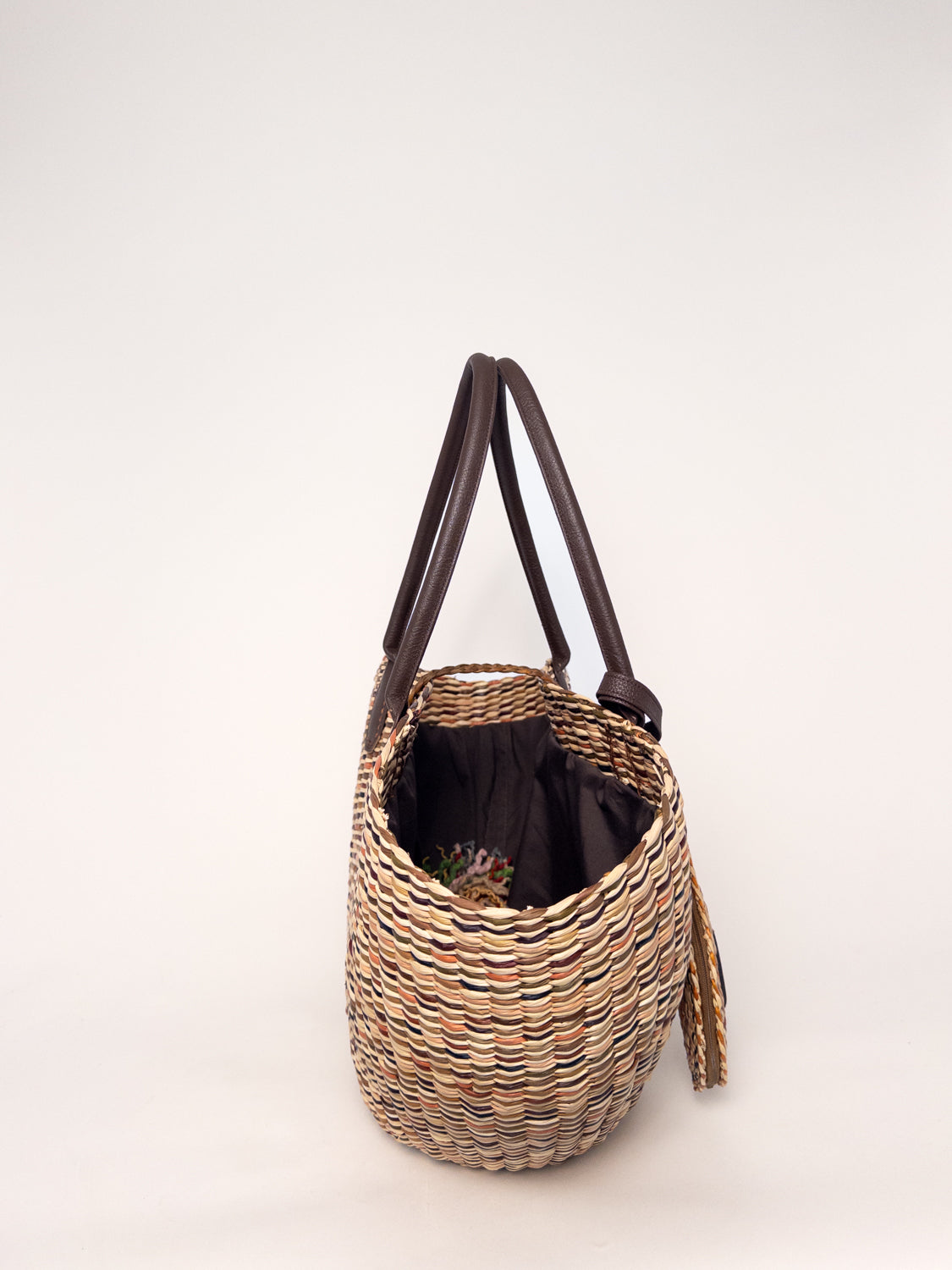 Playa Tote - Marbled Browns and Natural, handwoven junco tote bag with faux leather straps and a cotton top closure.