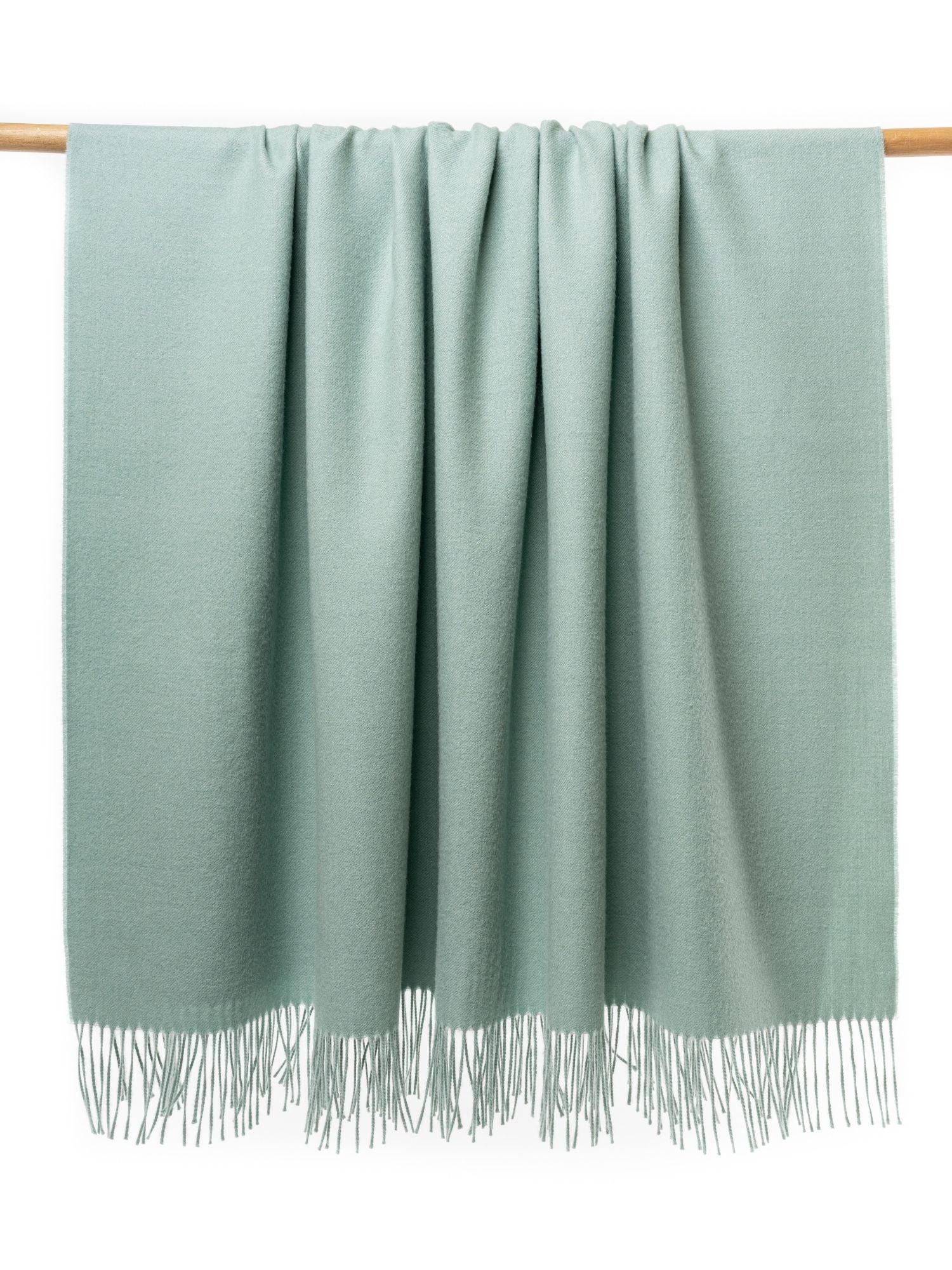Premium classic alpaca wool throw blanket in pastel green - luxury sustainable throw