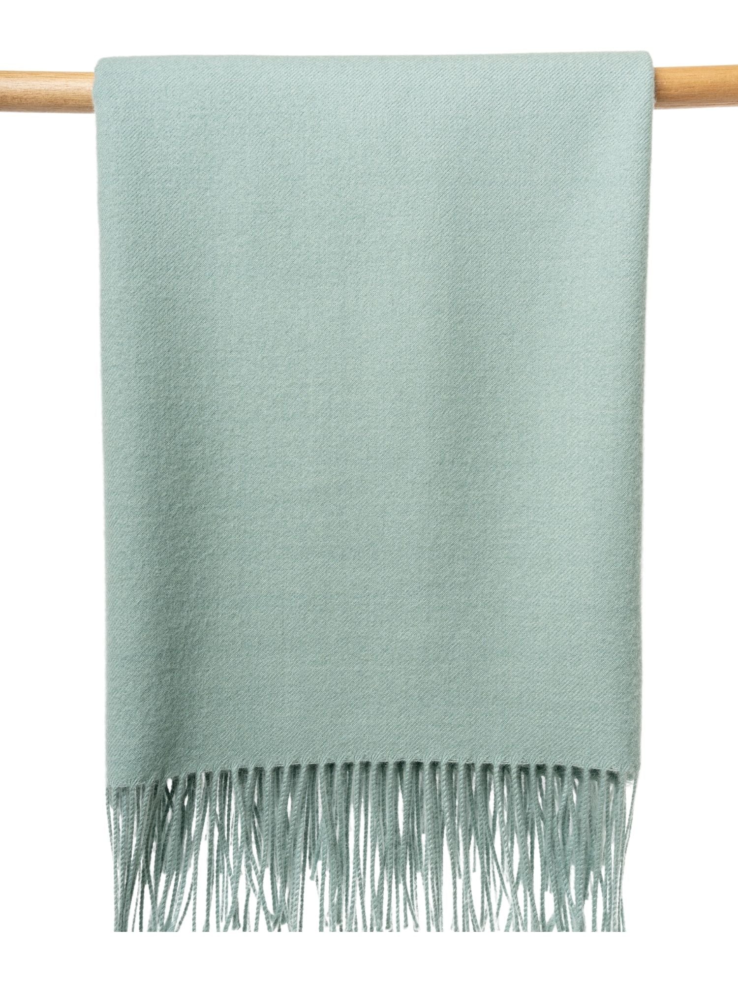 Peruvian made alpaca wool throw in pastel green - softer than cashmere luxury blanket handcrafted in Peru with premium sustainable wool