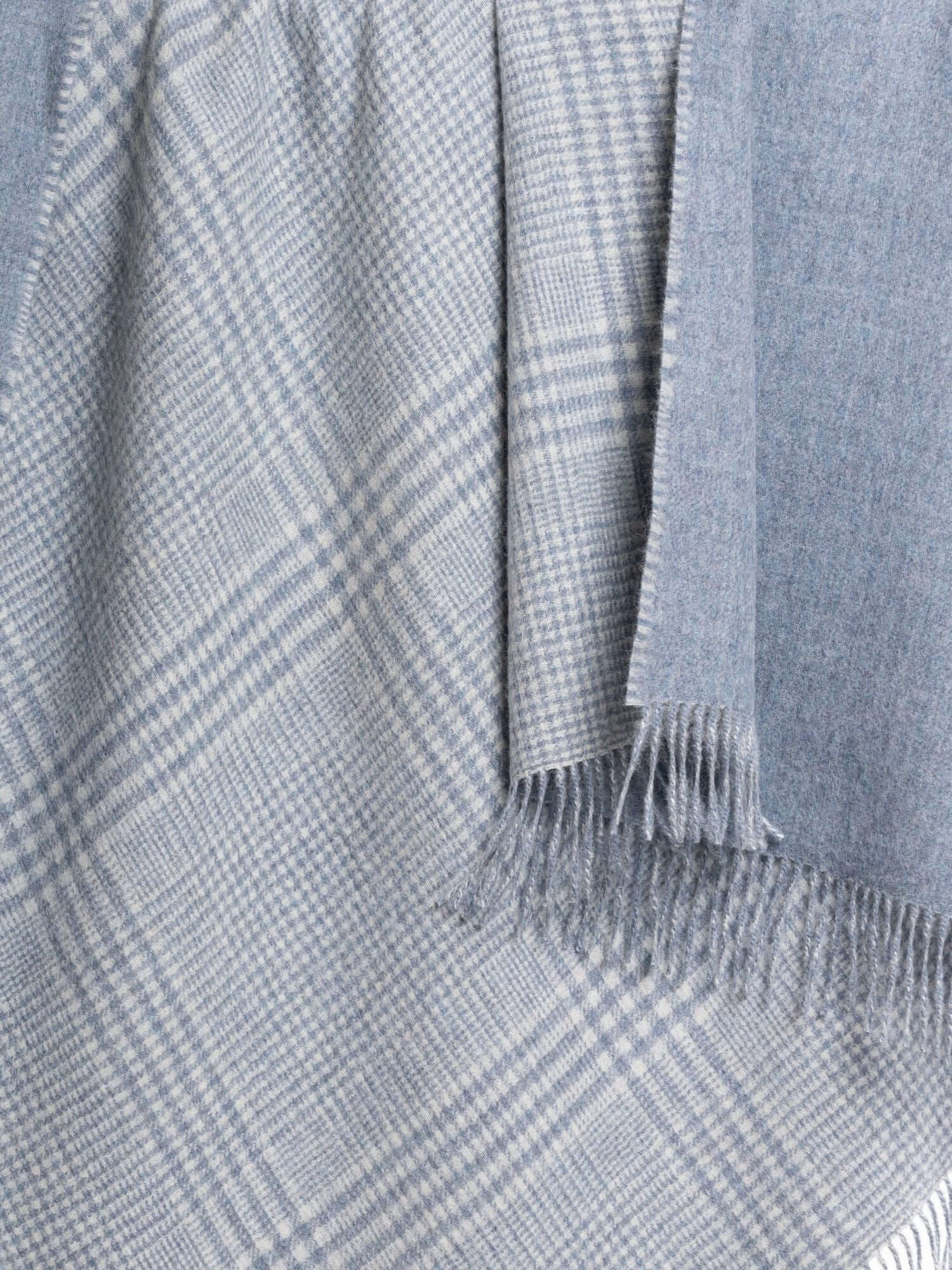 Light blue reversible baby alpaca throw showing plaid side – two-in-one alpaca blanket | Orange Inca