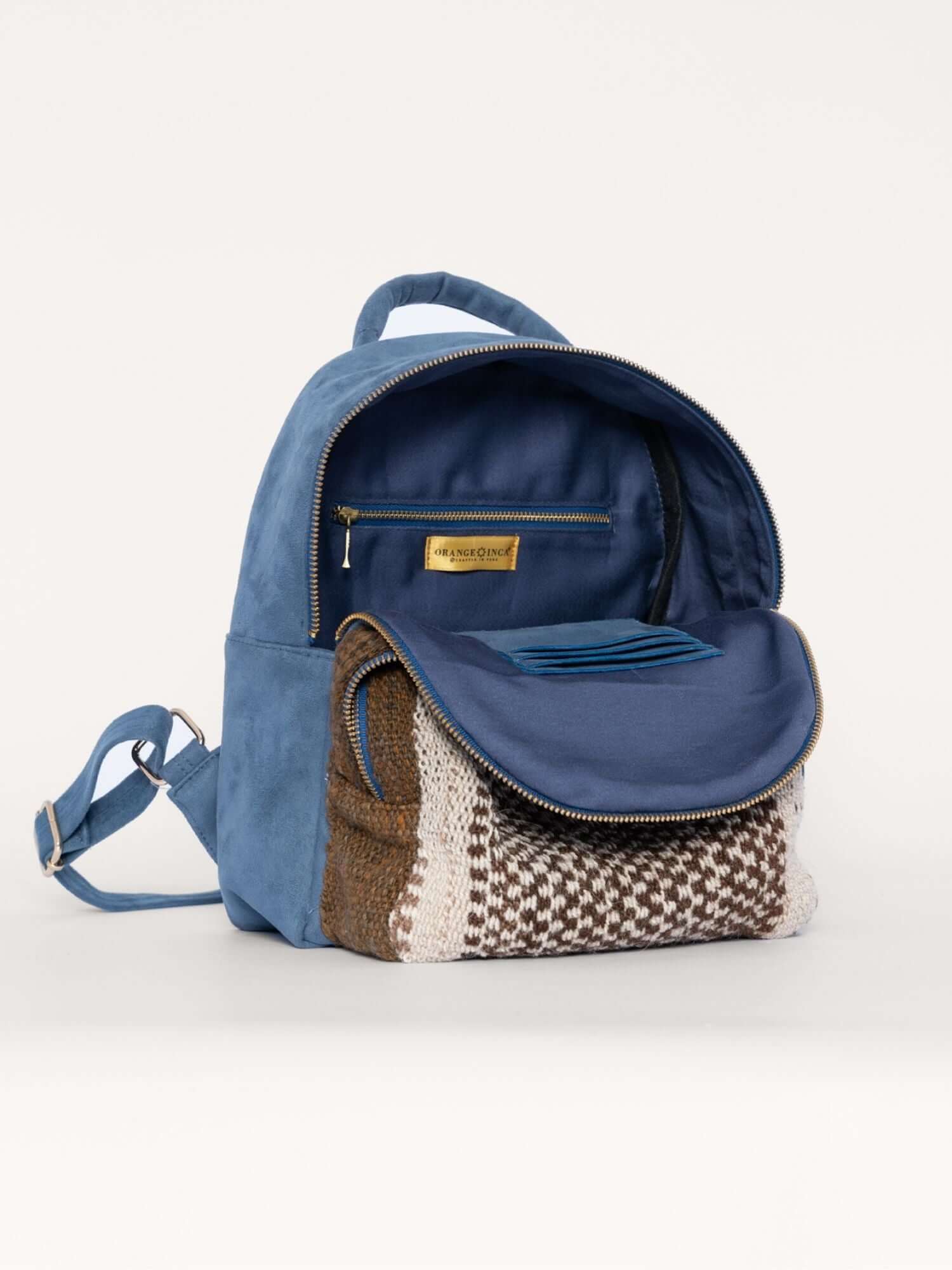 Interior view of Tierra Backpack – cotton lining with zip pocket and card holder for practical storage