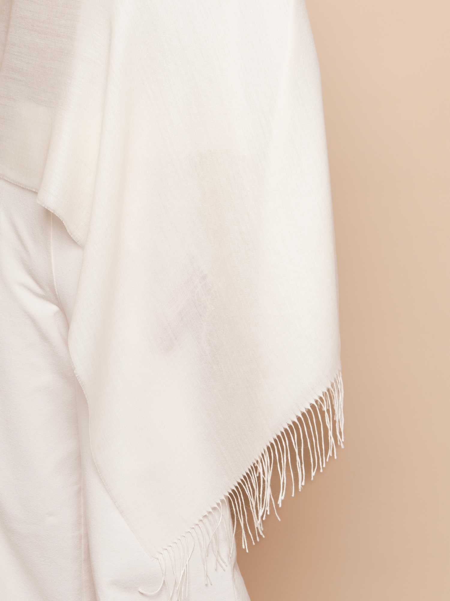 Ivory baby alpaca and silk shawl worn – sateen drape and fringe detail | Orange Inca
