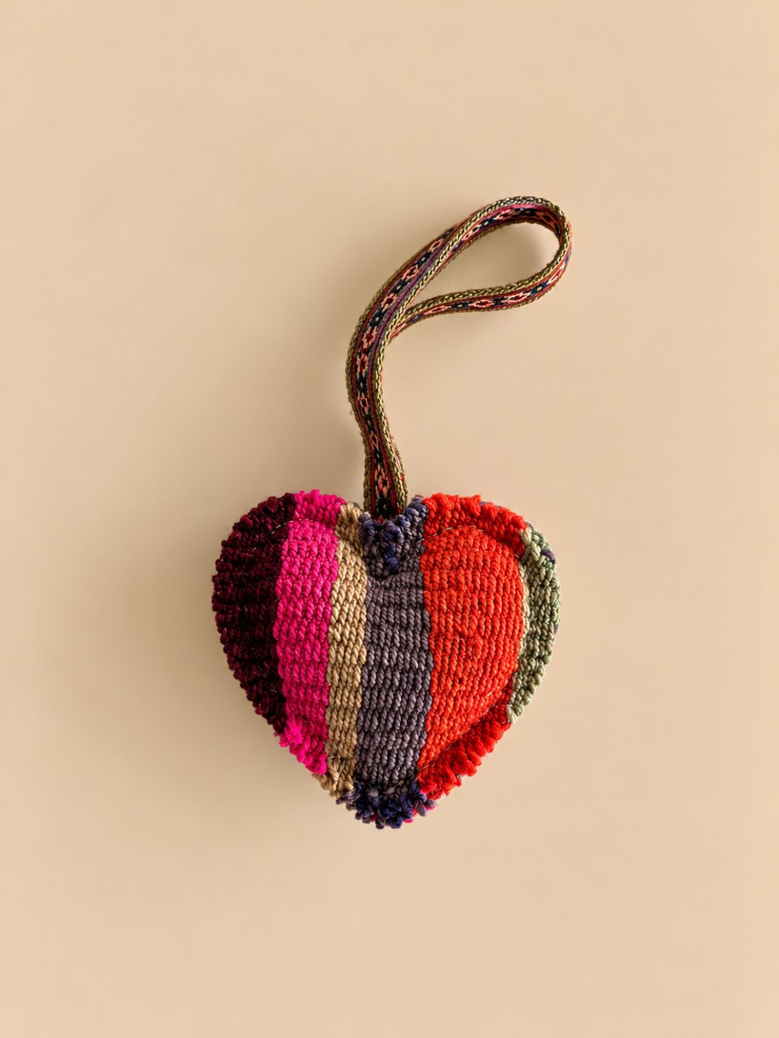 Medium heart wool charm in maroon, pink, tan and grey stripes with a woven loop | Tasselita by Orange Inca