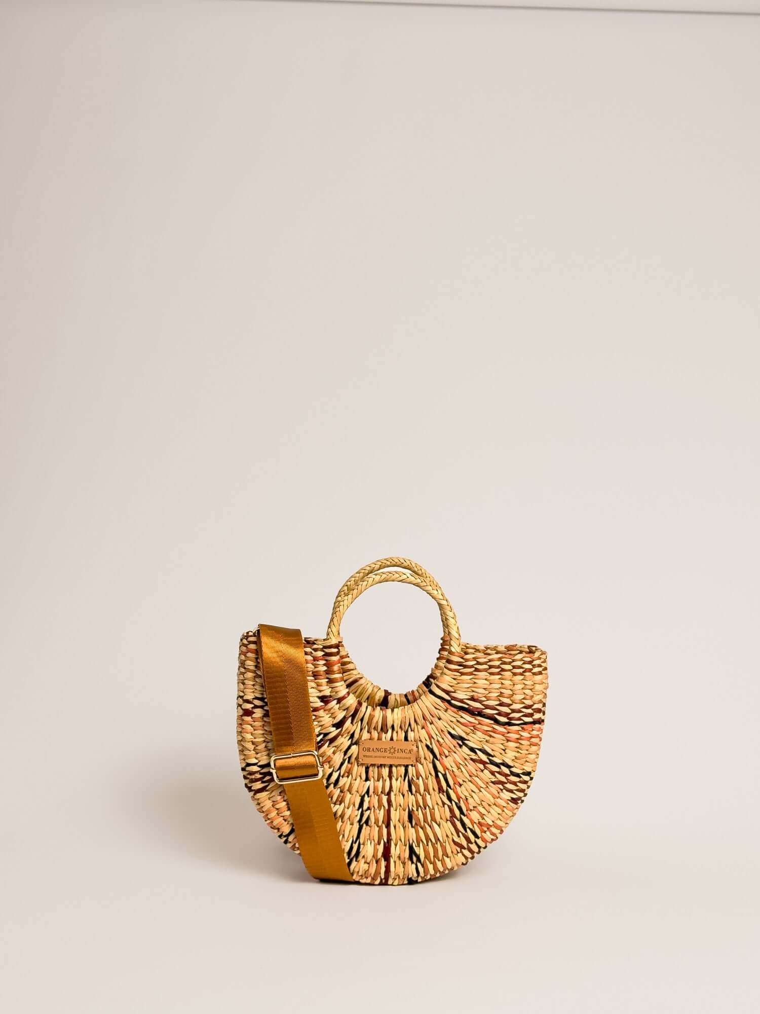 Designer straw crossbody bag by Orange Inca - mini purse | Marbled Brown
