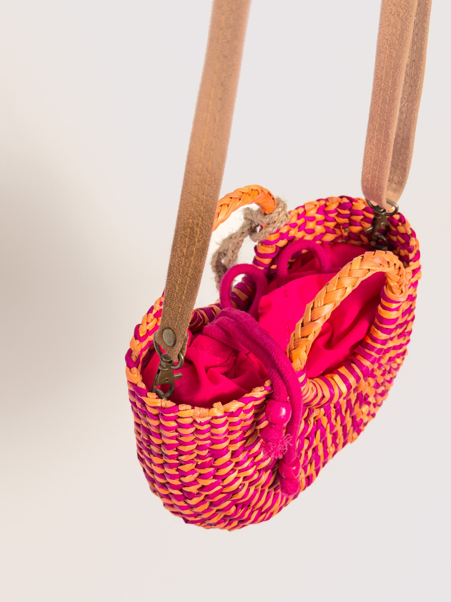 Inside Fiesta Mini reed crossbody bag with drawstring closure |Marbled Fuchsia Yellow