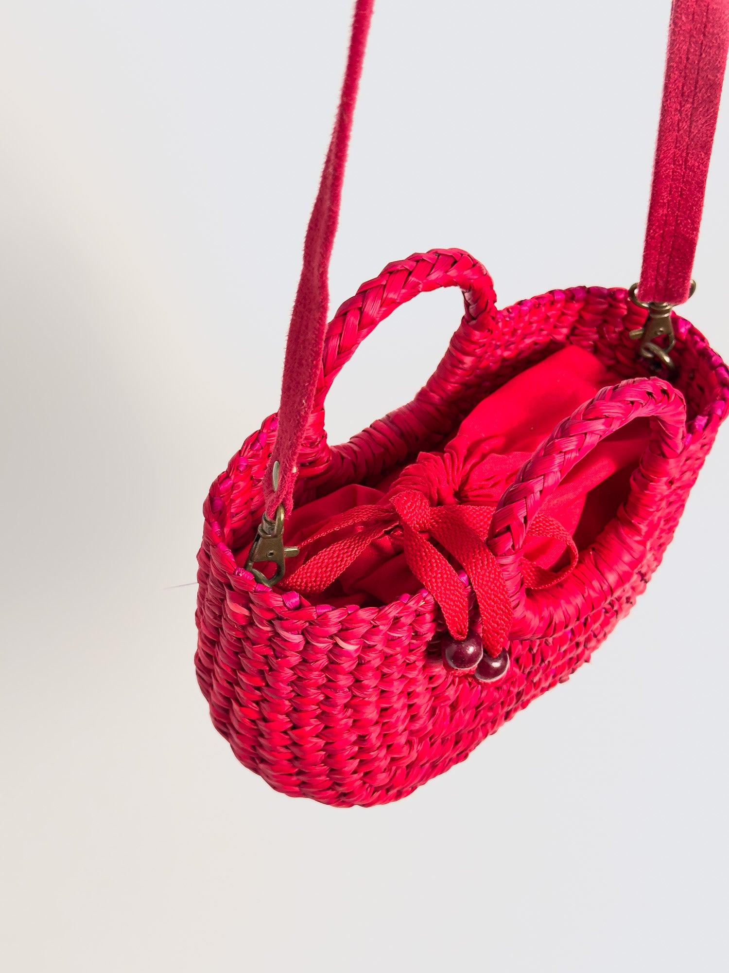 Inside Fiesta Mini reed crossbody bag with drawstring closure |Red