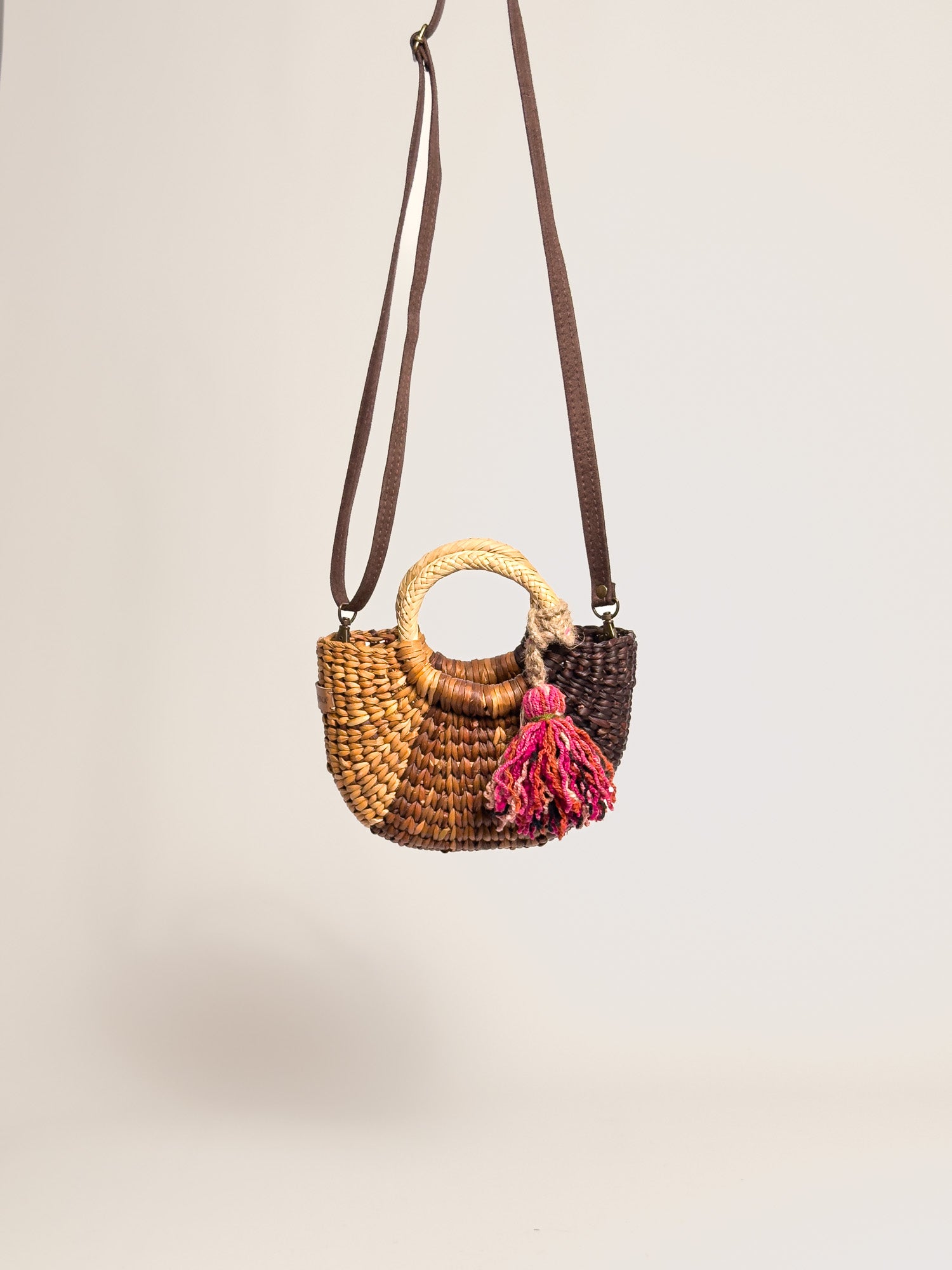 Orange Inca everyday mini bag with artisanal tassel and strap | Striped Brown