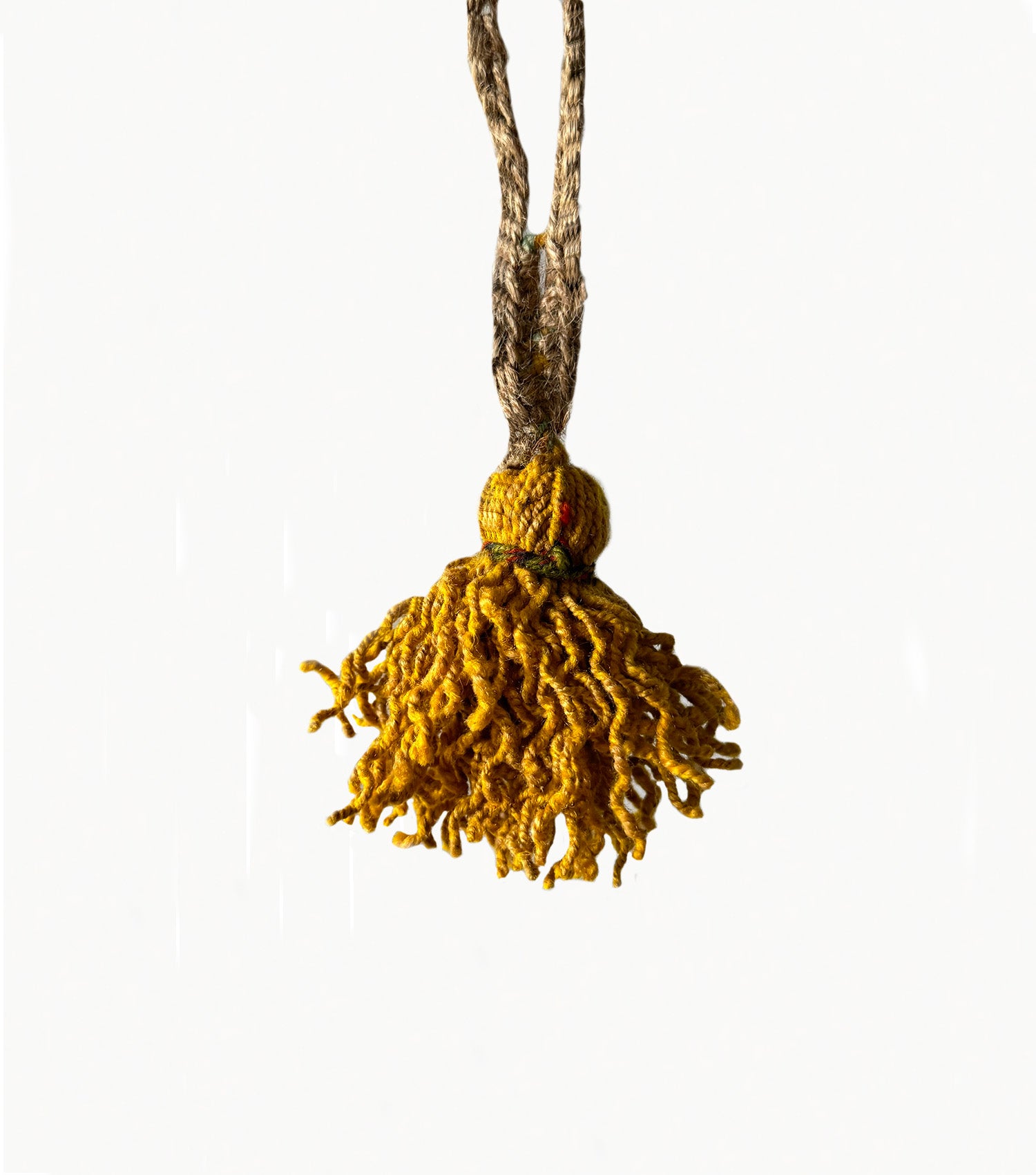 Fiesta Mini Tassel, from residuals of frazadas.