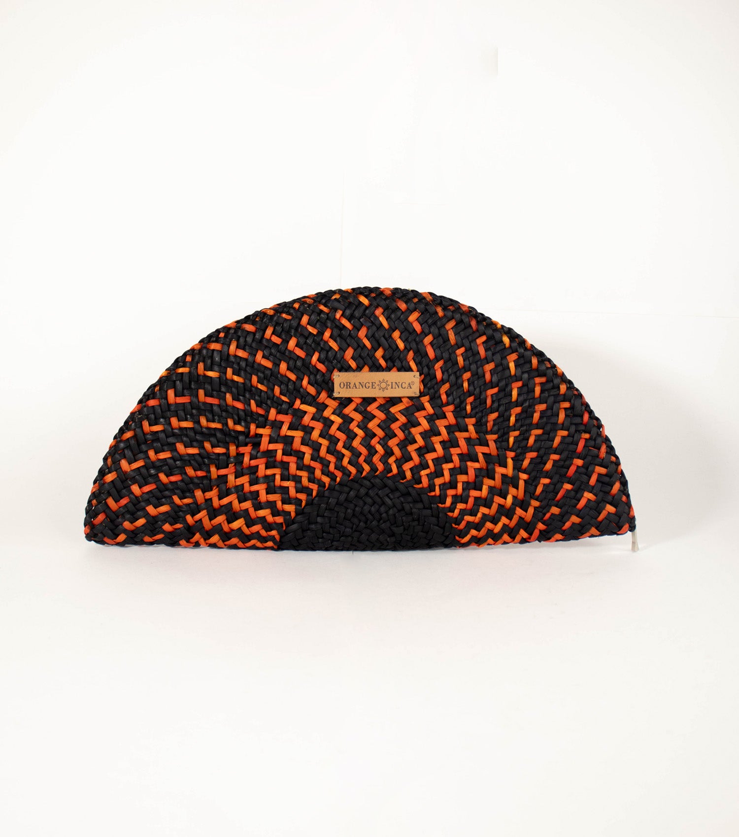 Flamenco Clutch front view - vibrant design with intricate craftsmanship, showcasing Black and Orange tones, and Orange Inca logo on vegetable leather.