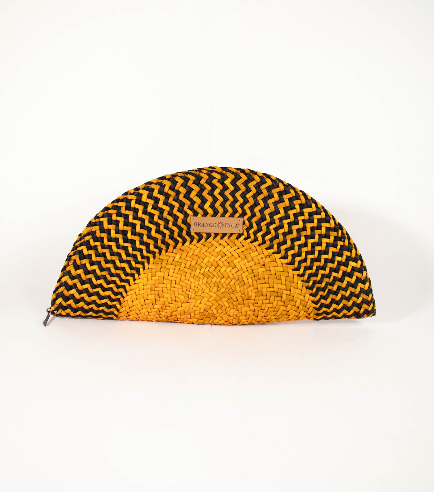 Flamenco Clutch front view - vibrant design with intricate craftsmanship, showcasing Mustard Yellow and Black tones, and Orange Inca logo on vegetable leather.