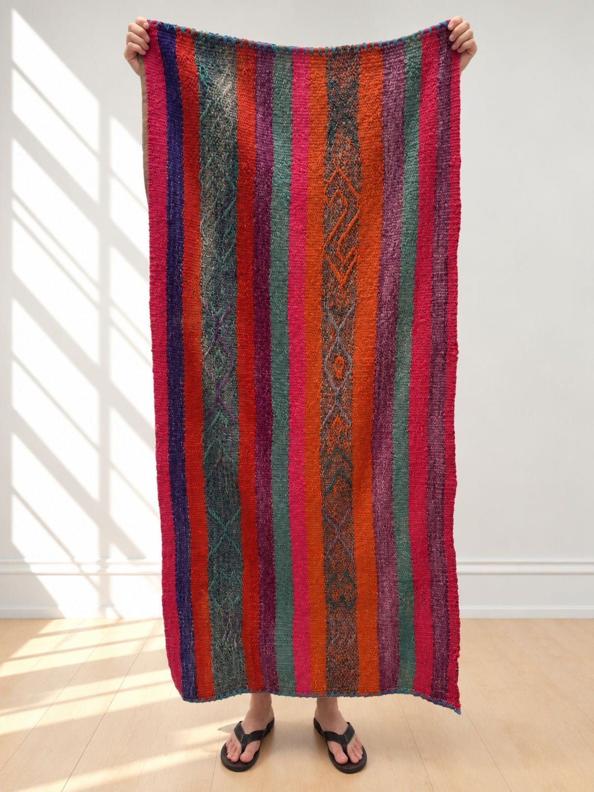Vintage frazada runner No. 1 held up in full — magenta, teal, orange and purple, handwoven Peruvian sheep and alpaca wool, 165 × 85 cm | Orange Inca