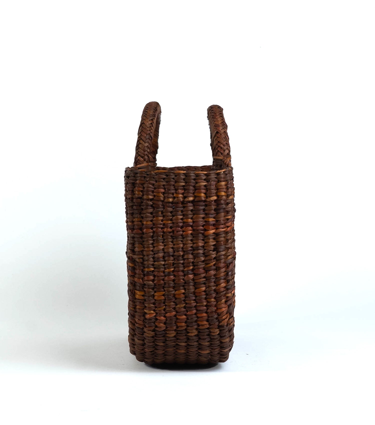 Side profile of Gran Fiesta straw tote - artisanal summer bag | Brown With Natural Stripes