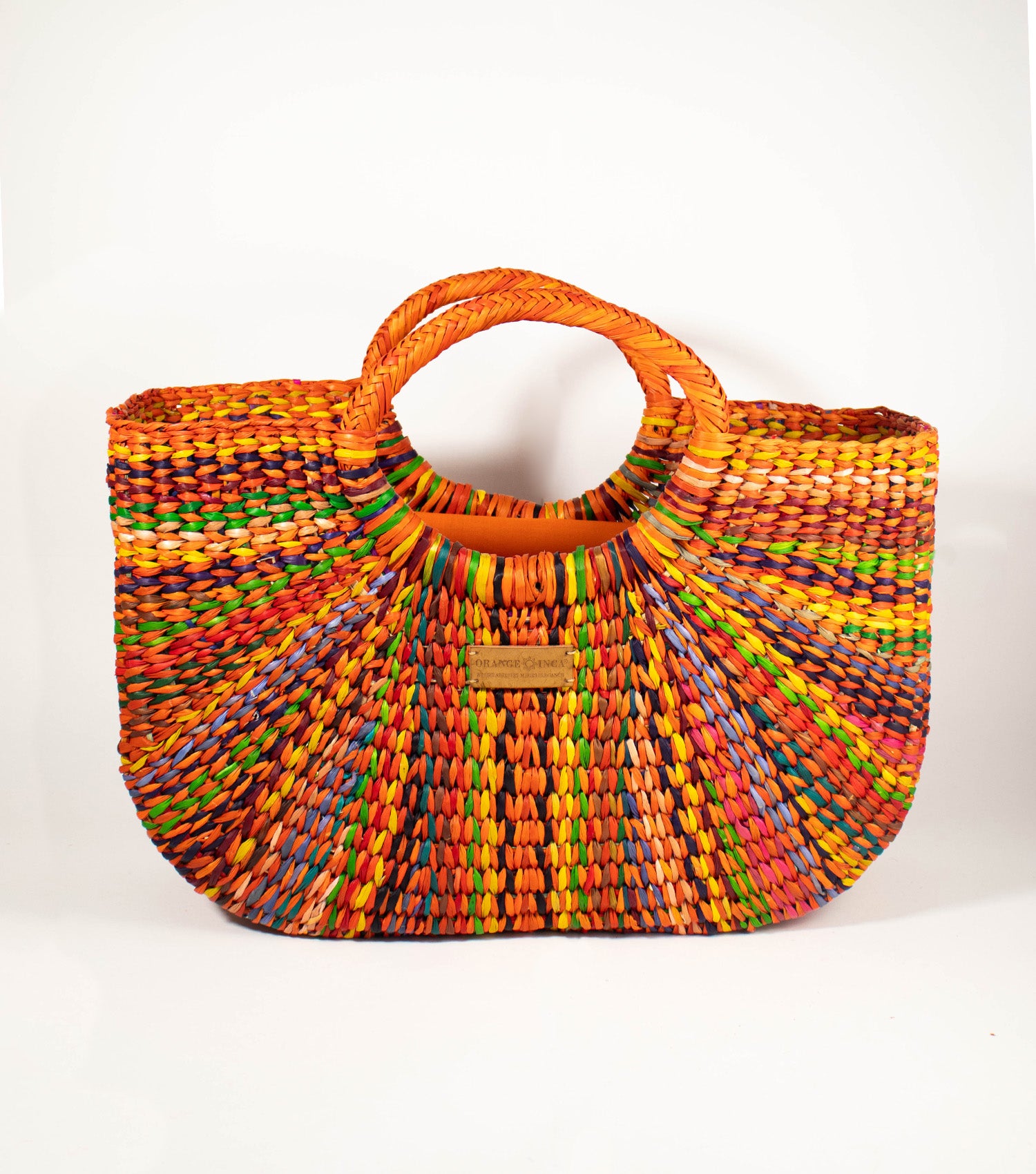 Gran Fiesta Tote front view - Orange Carnival junco weave showcases the tote's expansive and elegant design, embodying Orange Inca's commitment to artisanal beauty.