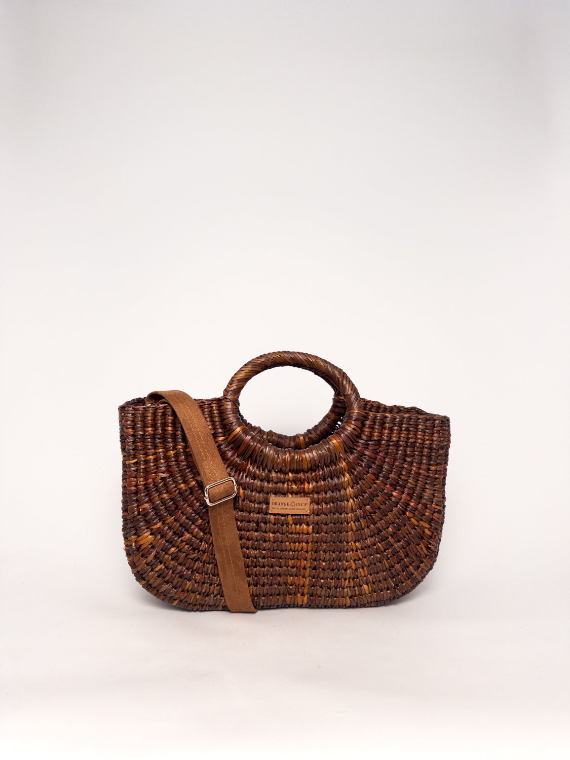 Gran Fiesta Crossbody Tote - Brown handwoven junco tote bag with structured handles and adjustable strap.