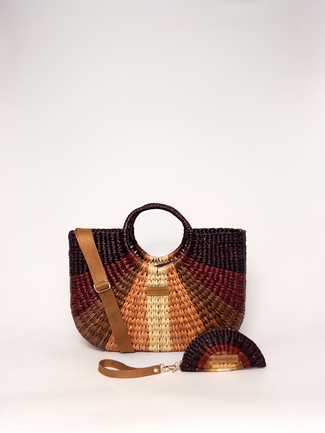 Gran Fiesta Crossbody Tote - Striped Browns and Natural handwoven junco tote bag with structured handles and adjustable strap.