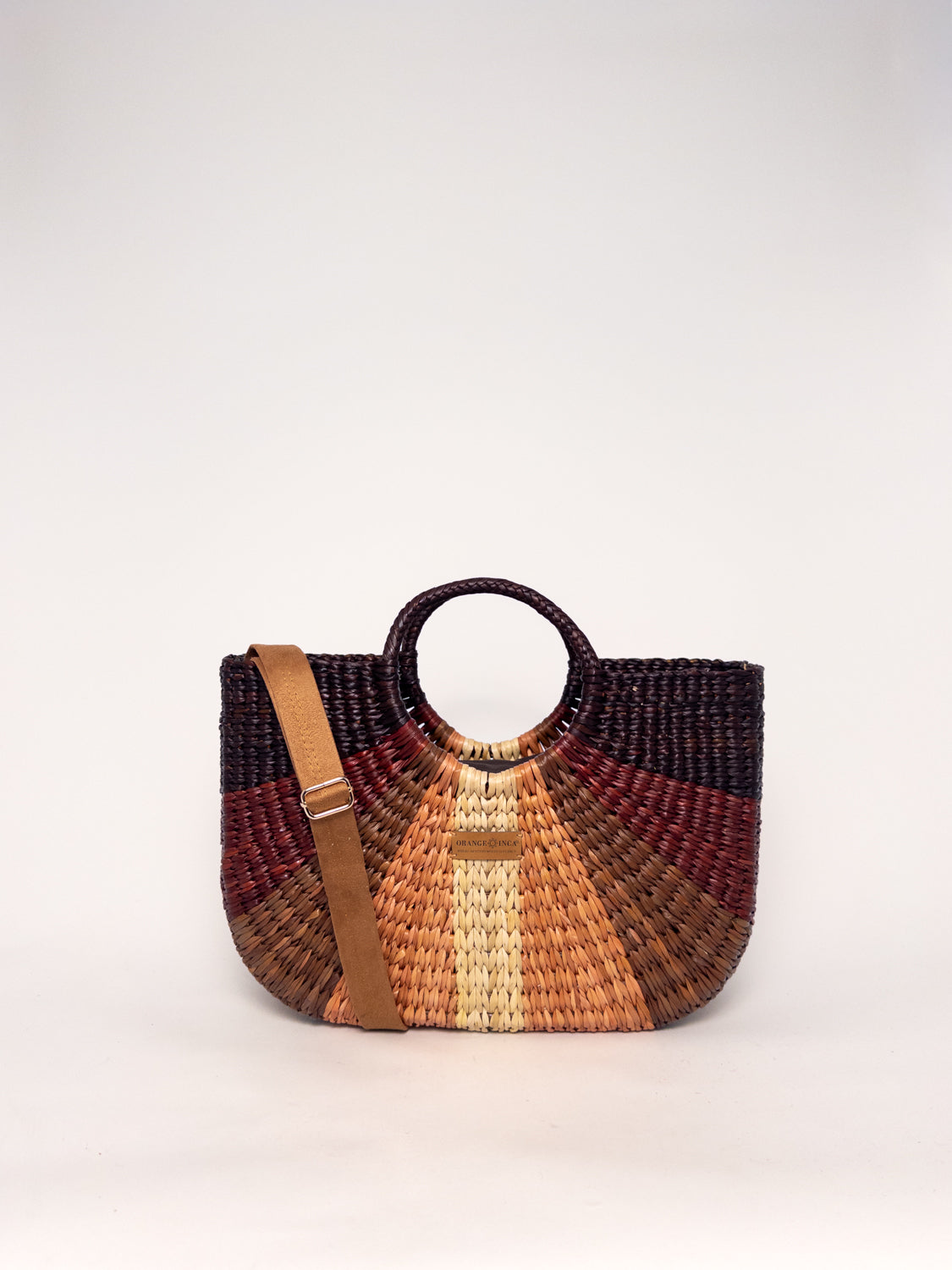 Gran Fiesta Crossbody Tote - Striped Browns and Natural, handwoven junco tote bag with structured handles and adjustable strap.