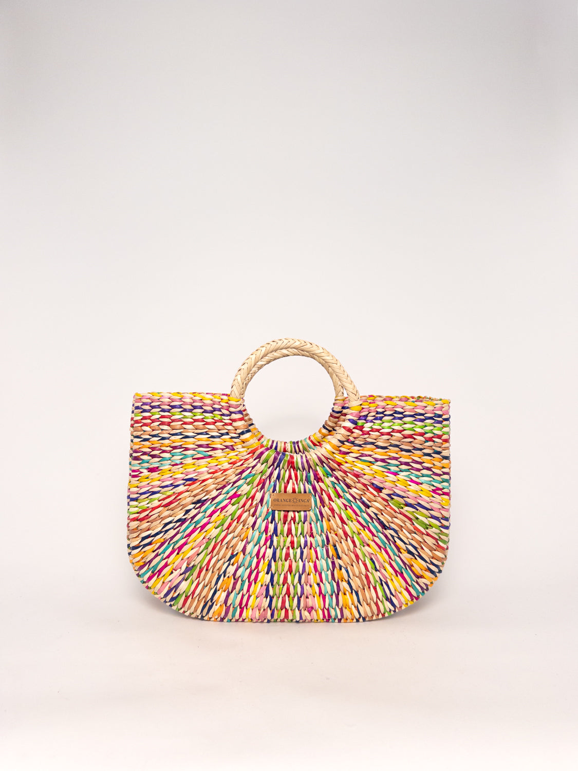 Gran Fiesta Crossbody Tote - Natural Carnival, handwoven junco tote bag, multi-colored, structured handbag, round handles.